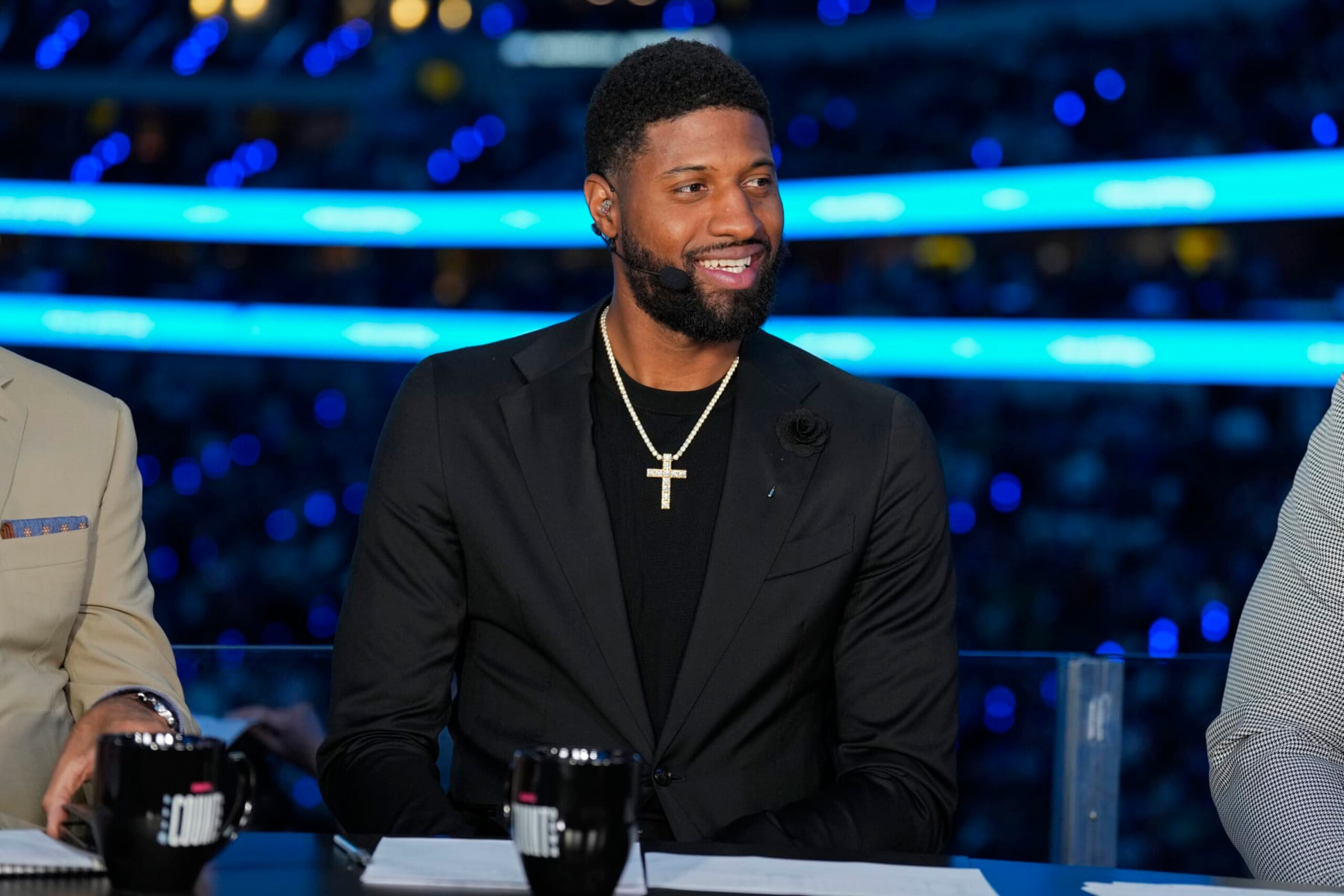 BOSTON, MA - JUNE 14: Paul George smiles during the game between the Boston Celtics and the Dallas Mavericks during Game Four of the 2024 NBA Finals on June 14, 2024 at the American Airlines Center in Dallas, Texas. NOTE TO USER: User expressly acknowledges and agrees that, by downloading and or using this photograph, User is consenting to the terms and conditions of the Getty Images License Agreement. Mandatory Copyright Notice: Copyright 2024 NBAE (Photo by Jim Cowsert/NBAE via Getty Images) BOSTON, MA - JUNE 14: Paul George smiles during the game between the Boston Celtics and the Dallas Mavericks during Game Four of the 2024 NBA Finals on June 14, 2024 at the American Airlines Center in Dallas, Texas. NOTE TO USER: User expressly acknowledges and agrees that, by downloading and or using this photograph, User is consenting to the terms and conditions of the Getty Images License Agreement. Mandatory Copyright Notice: Copyright 2024 NBAE (Photo by Jim Cowsert/NBAE via Getty Images)
