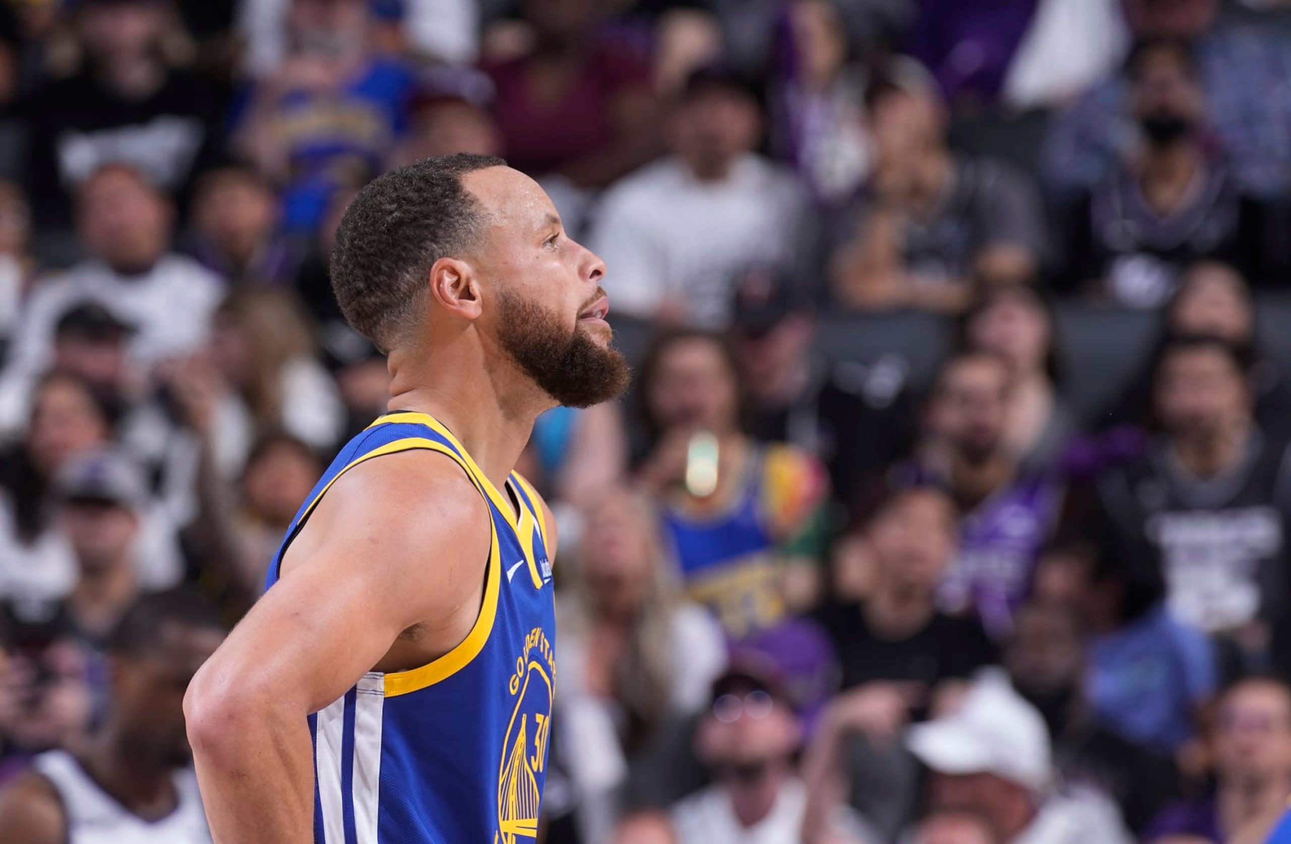 SACRAMENTO, CA - APRIL 16: Stephen Curry #30 of the Golden State Warriors looks on during the game against the Sacramento Kings during the 2024 Play-In Tournament on April 16, 2024 at Golden 1 Center in Sacramento, California. NOTE TO USER: User expressly acknowledges and agrees that, by downloading and or using this photograph, User is consenting to the terms and conditions of the Getty Images Agreement. Mandatory Copyright Notice: Copyright 2024 NBAE (Photo by Rocky Widner/NBAE via Getty Images)
