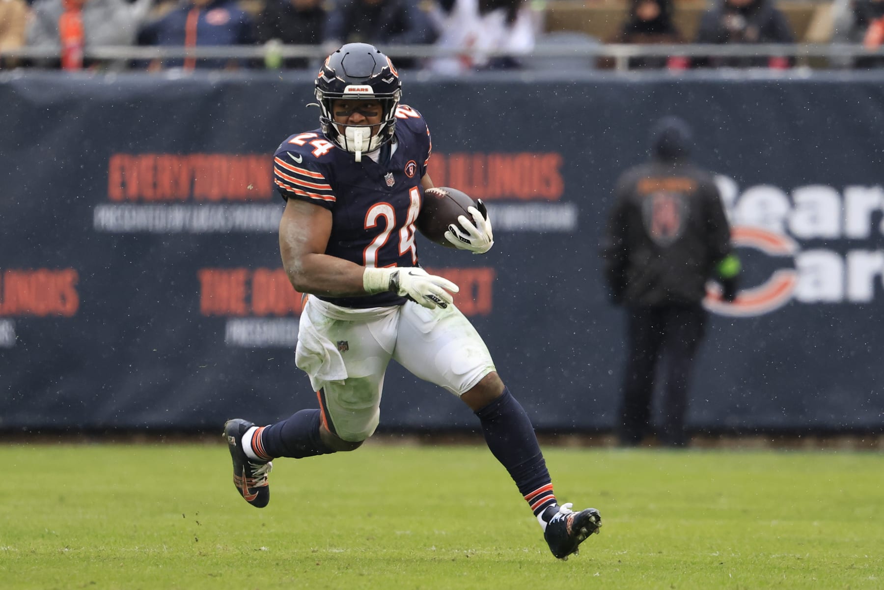 CHICAGO, ILLINOIS - DECEMBER 31: Khalil Herbert #24 of the Chicago Bears runs the ball in the game against the Atlanta Falcons at Soldier Field on December 31, 2023 in Chicago, Illinois. (Photo by Justin Casterline/Getty Images)