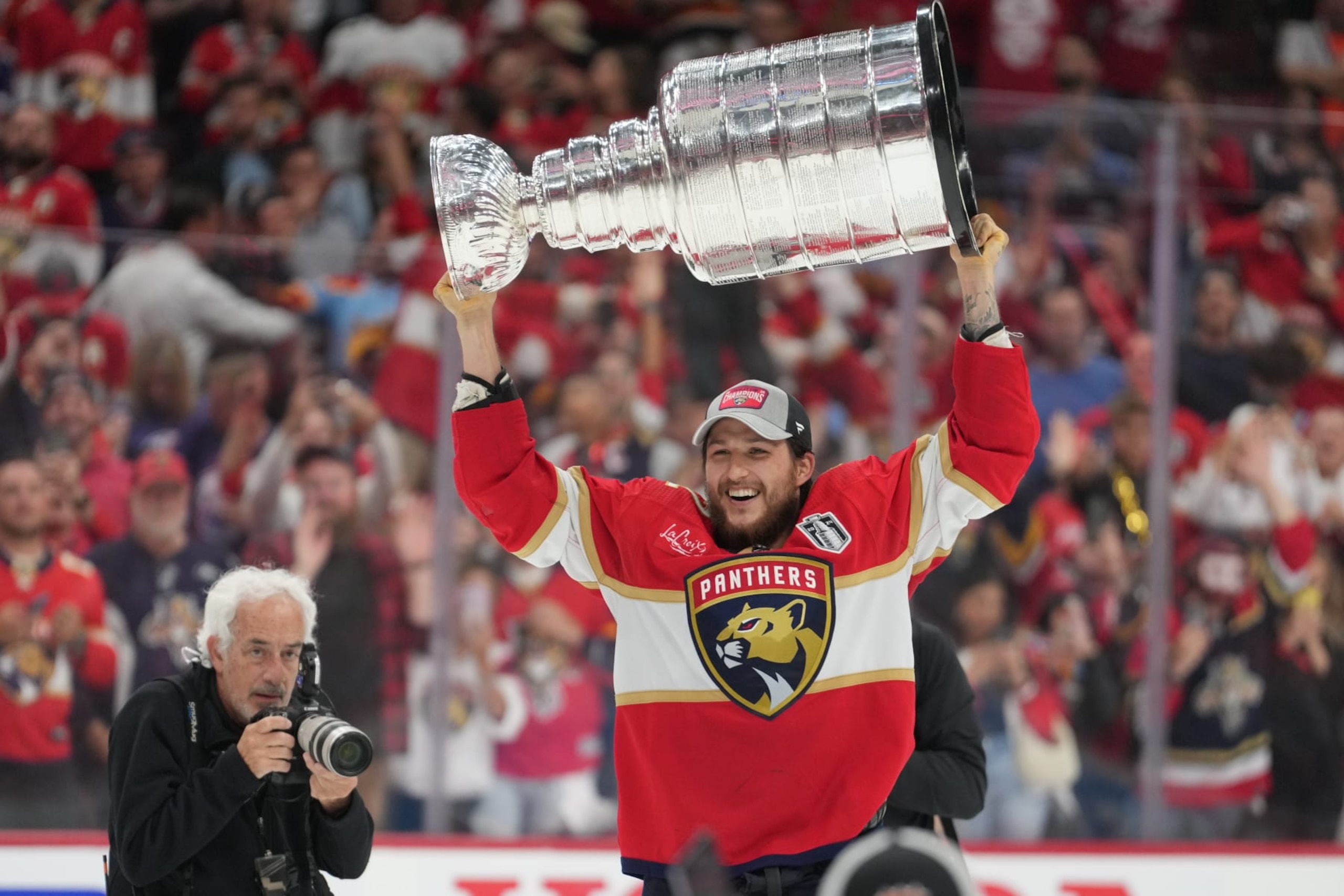 SUNRISE, FL - JUNE 24: Florida Panthers defenseman Brandon Montour (62) celebrates with the Stanley Cup following game seven of the Stanley Cup Finals between the Edmonton Oilers and the Florida Panthers on Monday, June 24, 2024  at Amerant Bank Arena in Sunrise, Fla. (Photo by Peter Joneleit/Icon Sportswire via Getty Images)