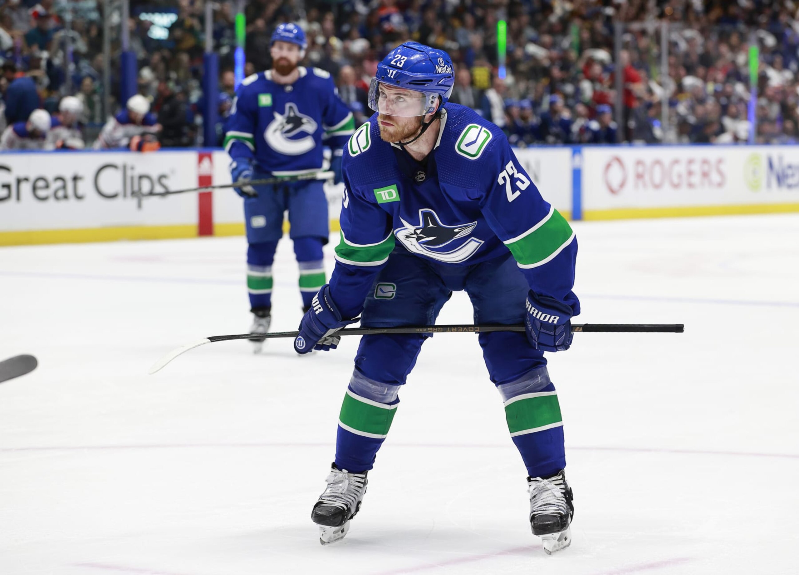 VANCOUVER, CANADA - MAY 10: Elias Lindholm #23 of the Vancouver Canucks lines up for a face off in Game Two of the Second Round of the 2024 Stanley Cup Playoffs against the Edmonton Oilers at Rogers Arena on May 10, 2024 in Vancouver, British Columbia, Canada.  (Photo by Jeff Vinnick/NHLI via Getty Images)