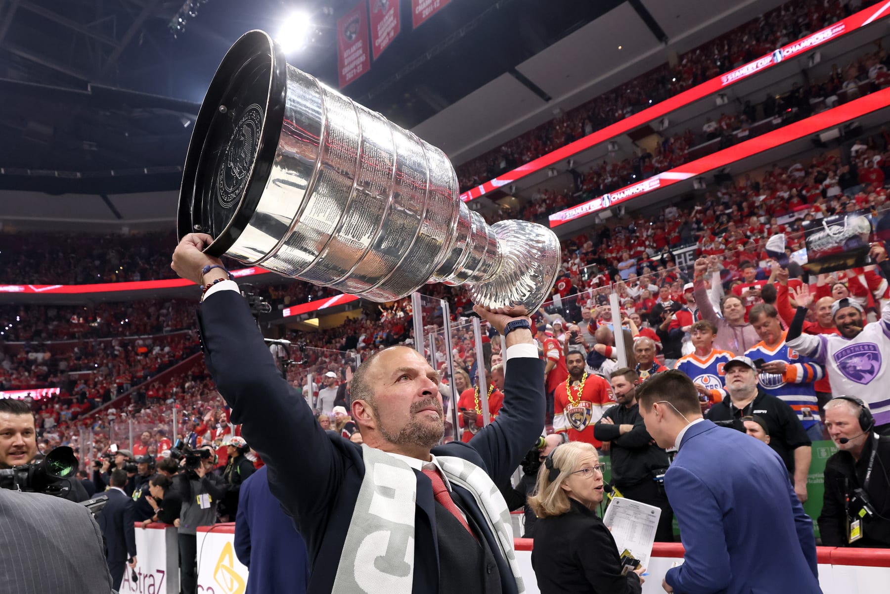 SUNRISE, FLORIDA - JUNE 24: President and general manager Bill Zito of the Florida Panthers hoists the Stanley Cup after Florida's 2-1 victory against the Edmonton Oilers in Game Seven of the 2024 Stanley Cup Final at Amerant Bank Arena on June 24, 2024 in Sunrise, Florida. (Photo by Bruce Bennett/Getty Images)