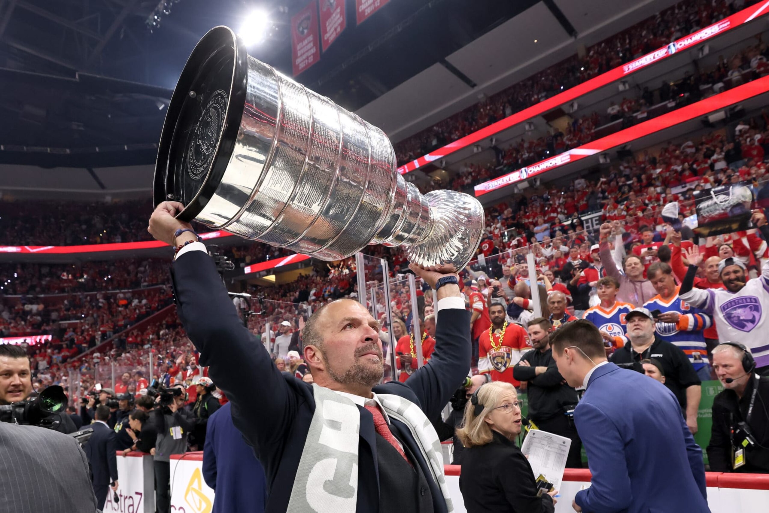 SUNRISE, FLORIDA - JUNE 24: President and general manager Bill Zito of the Florida Panthers hoists the Stanley Cup after Florida's 2-1 victory against the Edmonton Oilers in Game Seven of the 2024 Stanley Cup Final at Amerant Bank Arena on June 24, 2024 in Sunrise, Florida. (Photo by Bruce Bennett/Getty Images)