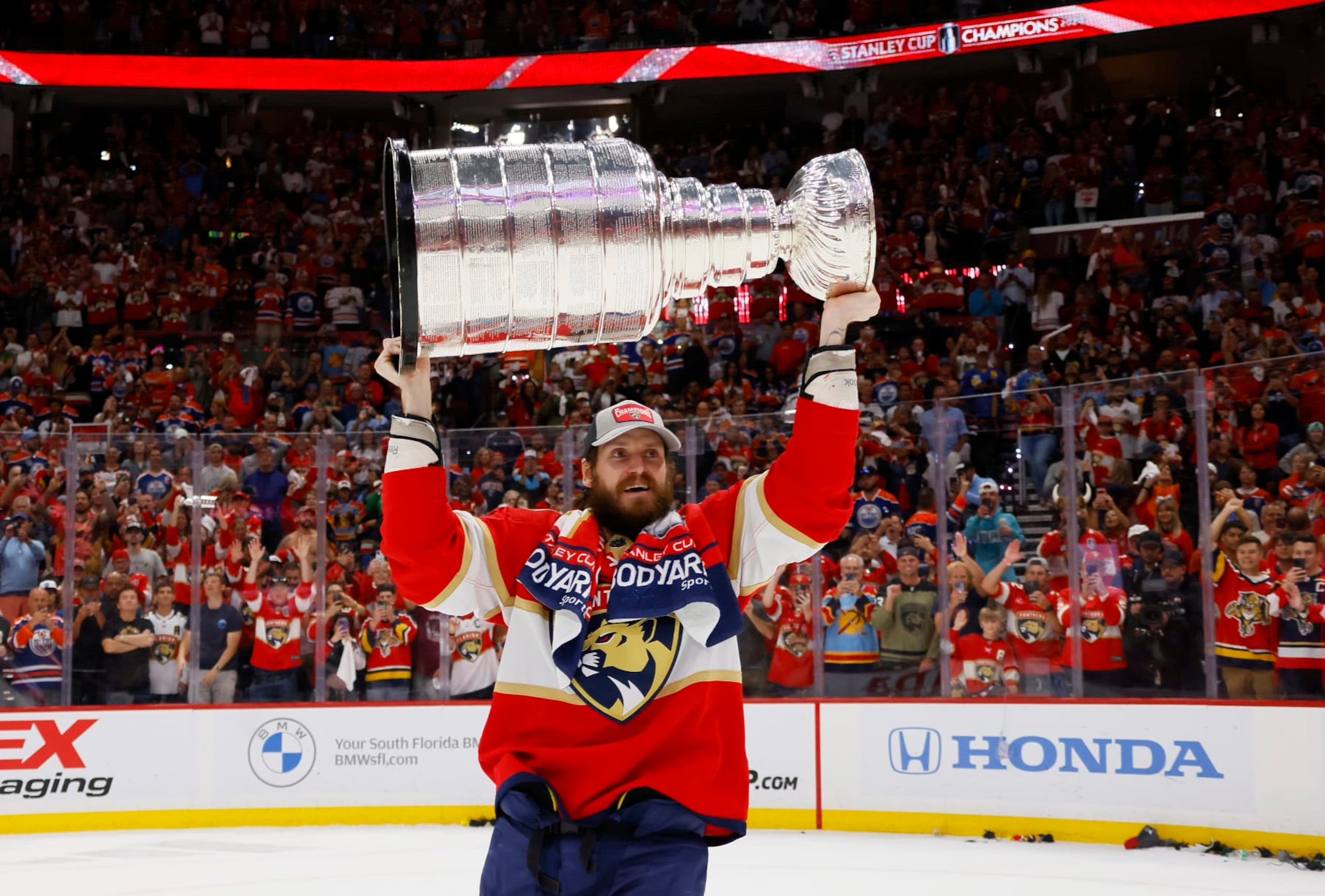 SUNRISE, FLORIDA - JUNE 24: Oliver Ekman-Larsson #91 of the Florida Panthers lifts the Stanley Cup after Florida's 2-1 victory against the Edmonton Oilers in Game Seven of the 2024 Stanley Cup Final at Amerant Bank Arena on June 24, 2024 in Sunrise, Florida. (Photo by Bruce Bennett/Getty Images)