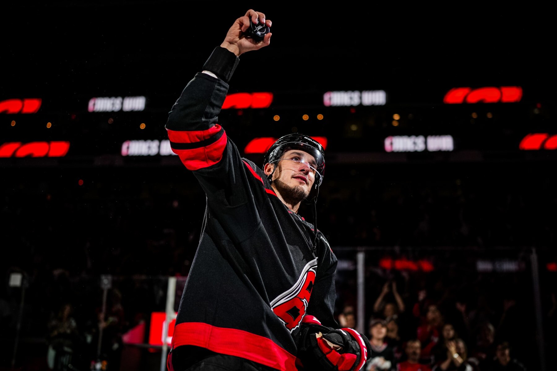 RALEIGH, NORTH CAROLINA - MAY 11: Brady Skjei #76 of the Carolina Hurricanes takes the ice after receiving one of the games three stars after defeating the New York Rangers in Game Four of the Second Round of the 2024 Stanley Cup Playoffs at PNC Arena on May 11, 2024 in Raleigh, North Carolina.  (Photo by Josh Lavallee/NHLI via Getty Images)