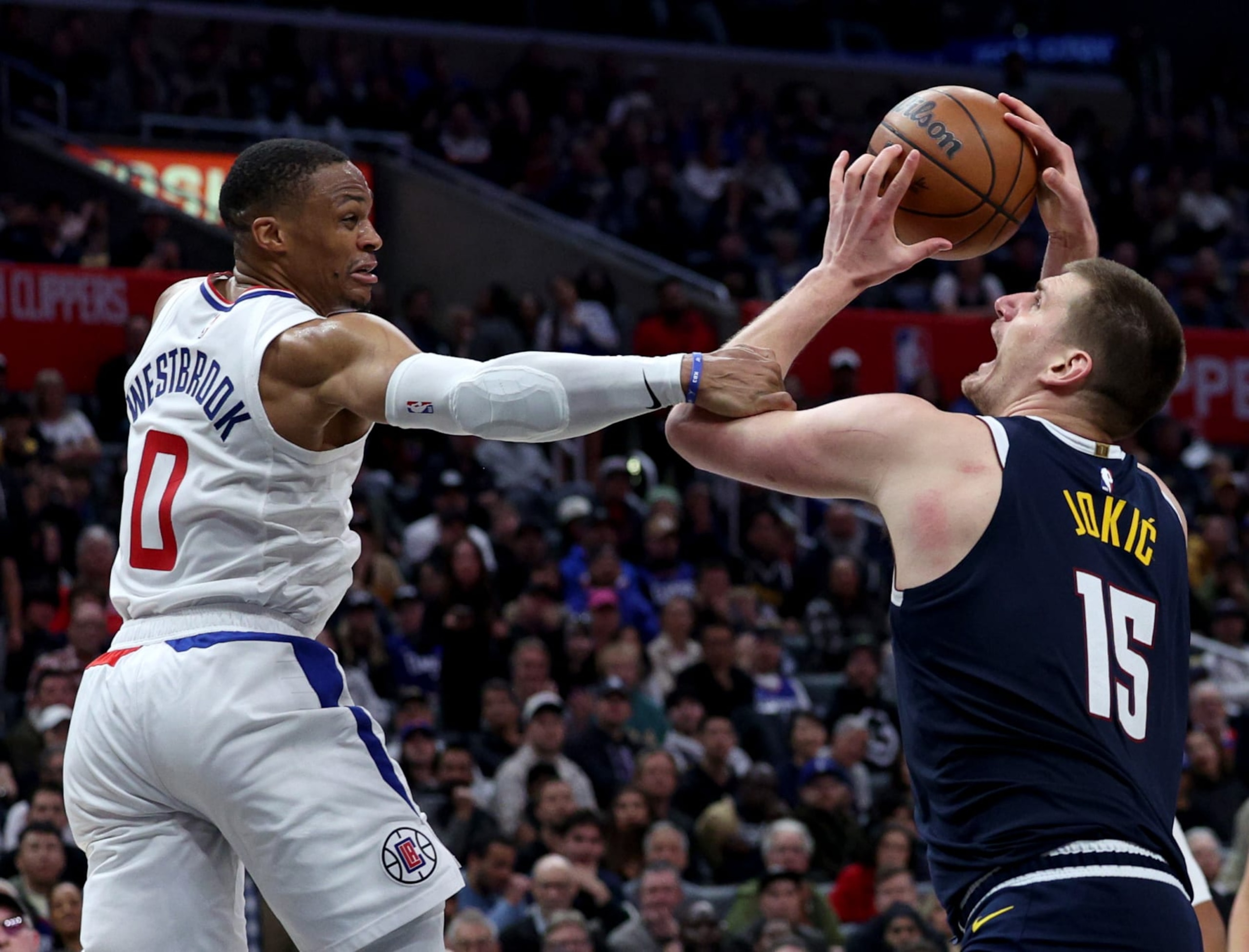 LOS ANGELES, CALIFORNIA - APRIL 04: Nikola Jokic #15 of the Denver Nuggets reacts as he is fouled by Russell Westbrook #0 of the LA Clippers during a 102-100 Clippers win at Crypto.com Arena on April 04, 2024 in Los Angeles, California. User is consenting to the terms and conditions of the Getty Images License Agreement. (Photo by Harry How/Getty Images) LOS ANGELES, CALIFORNIA - APRIL 04: Nikola Jokic #15 of the Denver Nuggets reacts as he is fouled by Russell Westbrook #0 of the LA Clippers during a 102-100 Clippers win at Crypto.com Arena on April 04, 2024 in Los Angeles, California. User is consenting to the terms and conditions of the Getty Images License Agreement. (Photo by Harry How/Getty Images)