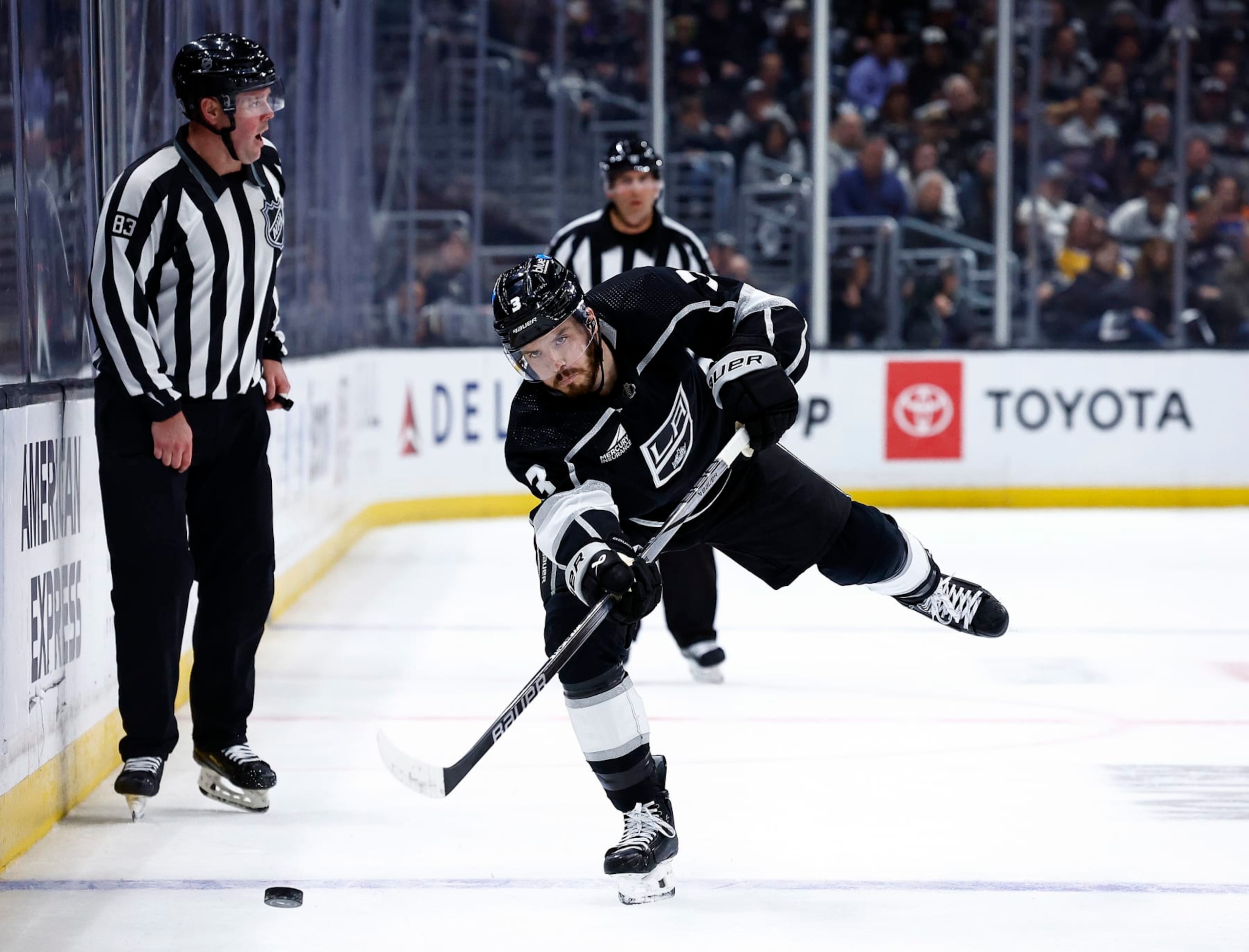 LOS ANGELES, CALIFORNIA - APRIL 28:  Matt Roy #3 of the Los Angeles Kings skates the puck against the Edmonton Oilers in the second period during Game Four of the First Round of the 2024 Stanley Cup Playoffs at Crypto.com Arena on April 28, 2024 in Los Angeles, California. (Photo by Ronald Martinez/Getty Images)