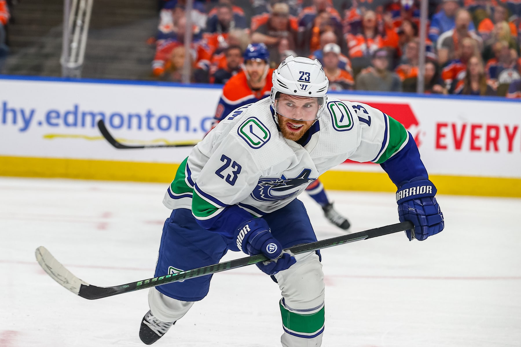 EDMONTON, AB - MAY 12: Vancouver Canucks Center Elias Lindholm (23) chases a puck in the first period of game five of the Western Conference Second Round Edmonton Oilers game versus the Vancouver Canucks on May 12, 2024 at Rogers Place in Edmonton, AB. (Photo by Curtis Comeau/Icon Sportswire via Getty Images)
