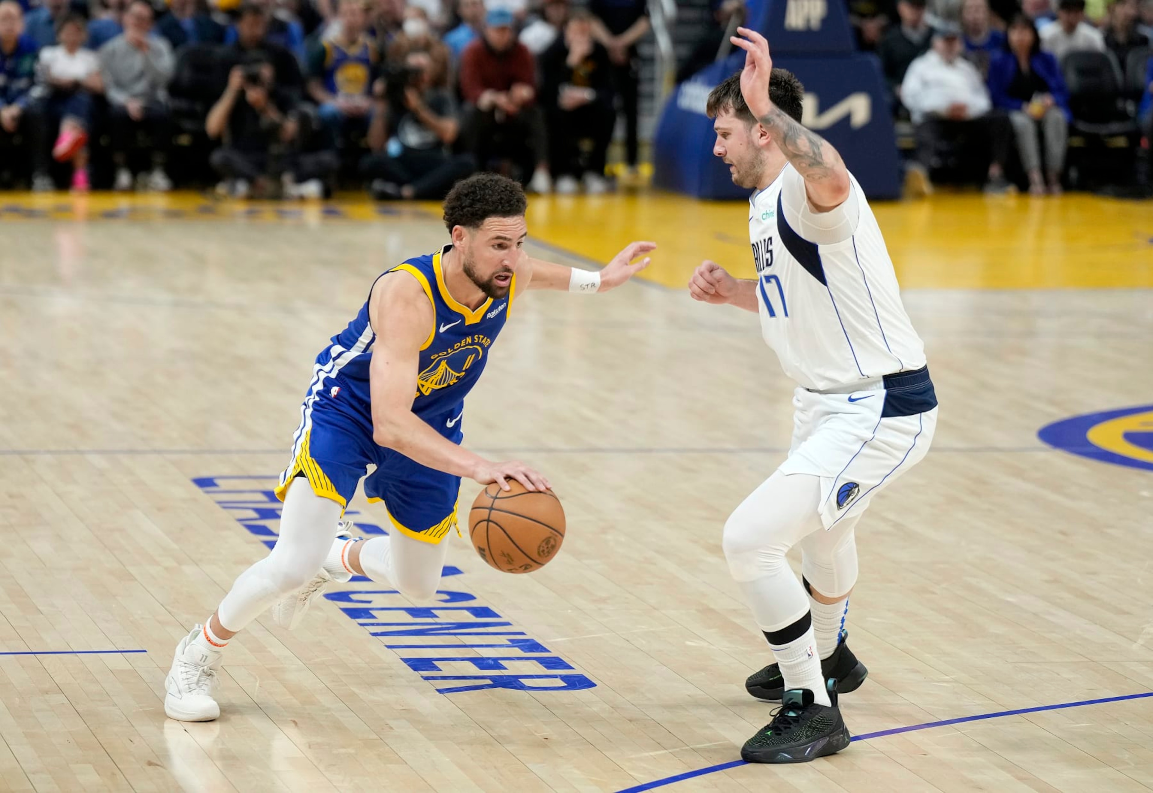 SAN FRANCISCO, CALIFORNIA - APRIL 02: Klay Thompson #11 of the Golden State Warriors dribbling the ball is guarded by Luka Doncic #77 of the Dallas Mavericks during the second half at Chase Center on April 02, 2024 in San Francisco, California. NOTE TO USER: User expressly acknowledges and agrees that, by downloading and or using this photograph, User is consenting to the terms and conditions of the Getty Images License Agreement. (Photo by Thearon W. Henderson/Getty Images) SAN FRANCISCO, CALIFORNIA - APRIL 02: Klay Thompson #11 of the Golden State Warriors dribbling the ball is guarded by Luka Doncic #77 of the Dallas Mavericks during the second half at Chase Center on April 02, 2024 in San Francisco, California. NOTE TO USER: User expressly acknowledges and agrees that, by downloading and or using this photograph, User is consenting to the terms and conditions of the Getty Images License Agreement. (Photo by Thearon W. Henderson/Getty Images)
