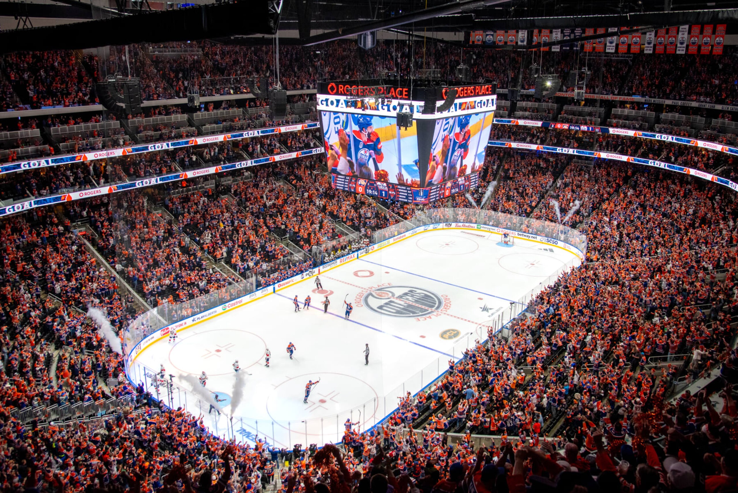 EDMONTON, CANADA - JUNE 21: A general view of fans celebrating after a goal during Game Six of the 2024 Stanley Cup Final between the Edmonton Oilers and the Florida Panthers at Rogers Place on June 21, 2024, in Edmonton, Alberta, Canada. (Photo by Andy Devlin/NHLI via Getty Images) EDMONTON, CANADA - JUNE 21: A general view of fans celebrating after a goal during Game Six of the 2024 Stanley Cup Final between the Edmonton Oilers and the Florida Panthers at Rogers Place on June 21, 2024, in Edmonton, Alberta, Canada. (Photo by Andy Devlin/NHLI via Getty Images)