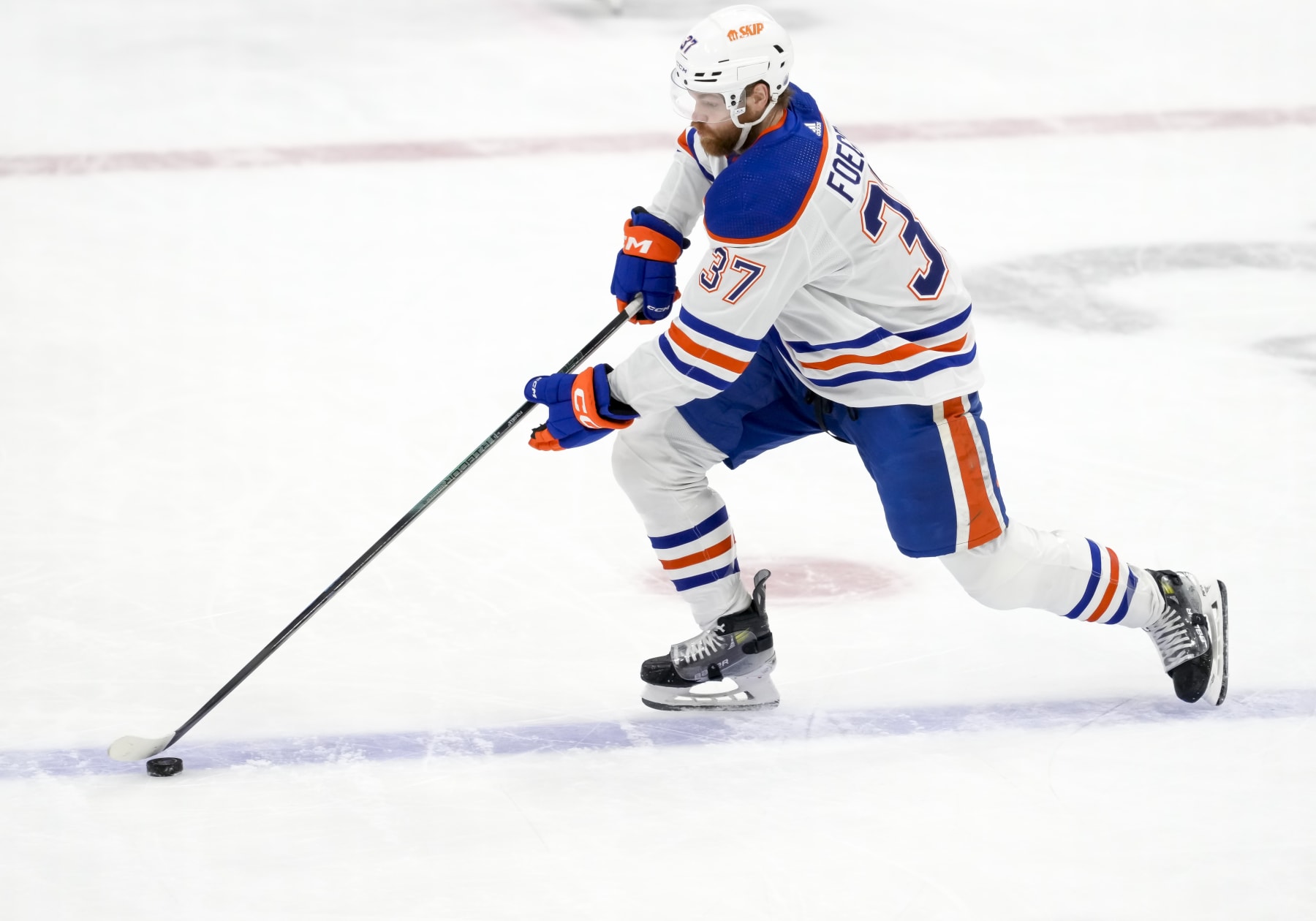 SUNRISE, FL - JUNE 24:  Edmonton Oilers left wing Warren Foegele (37) skates with the puck during the NHL Stanley Cup Finals, Game 7 between the Florida Panthers and Edmonton Oilers on June 24th, 2024 at Amerant Bank Arena in Sunrise, FL. (Photo by Andrew Bershaw/Icon Sportswire via Getty Images)