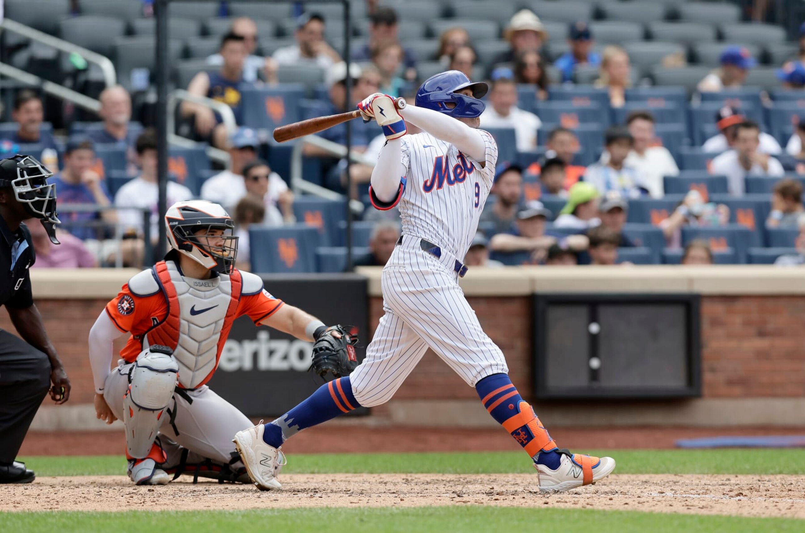 NEW YORK, NEW YORK - JUNE 30:  Brandon Nimmo #9 of the New York Mets follows through on his seventh inning two run home run against the Houston Astros at Citi Field on June 30, 2024 in New York City. (Photo by Jim McIsaac/Getty Images)