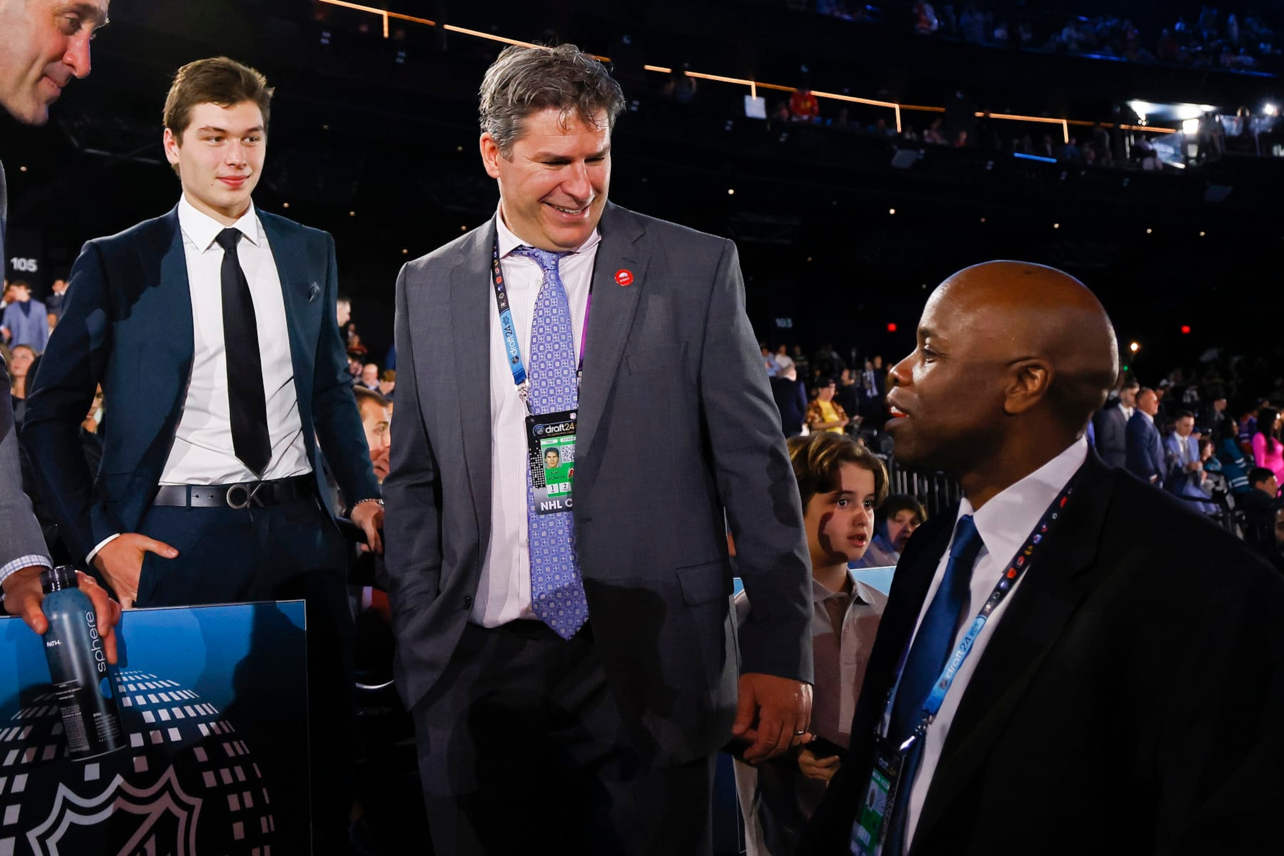 LAS VEGAS, NEVADA - JUNE 28: Macklin Celebrini, Scott Lachance and Mike Grier, from left, look on during the first round of the 2024 Upper Deck NHL Draft at Sphere on June 28, 2024 in Las Vegas, Nevada. (Photo by Bruce Bennett/Getty Images) LAS VEGAS, NEVADA - JUNE 28: Macklin Celebrini, Scott Lachance and Mike Grier, from left, look on during the first round of the 2024 Upper Deck NHL Draft at Sphere on June 28, 2024 in Las Vegas, Nevada. (Photo by Bruce Bennett/Getty Images)