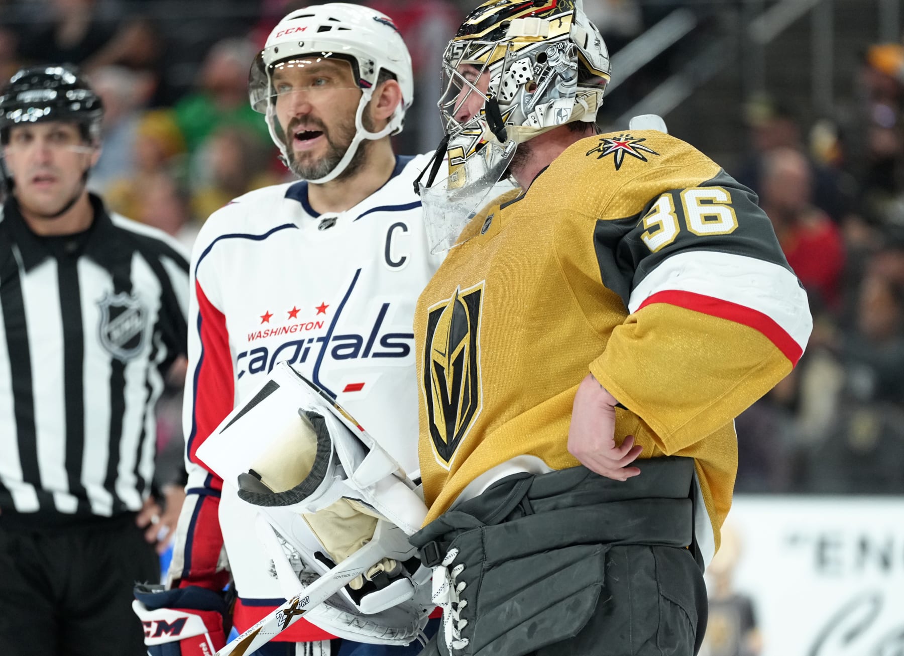 LAS VEGAS, NEVADA - APRIL 20: Alex Ovechkin #8 of the Washington Capitals and Logan Thompson #36 of the Vegas Golden Knights talk during the second period of their game at T-Mobile Arena on April 20, 2022 in Las Vegas, Nevada. (Photo by Jeff Bottari/NHLI via Getty Images)