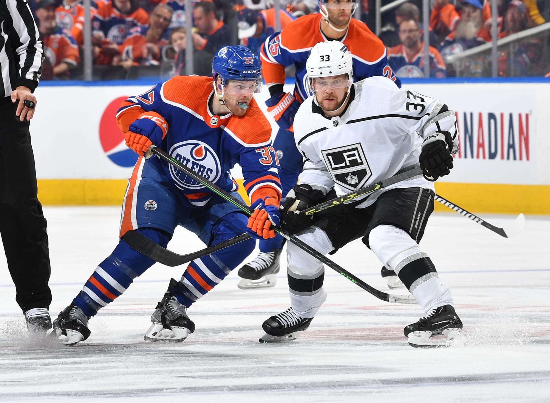 EDMONTON, CANADA - APRIL 25: Warren Foegele #37 of the Edmonton Oilers and Viktor Arvidsson #33 of the Los Angeles Kings battle for position in Game Five of the First Round of the 2023 Stanley Cup Playoffs at Rogers Place on April 25, 2023, in Edmonton, Alberta, Canada. (Photo by Andy Devlin/NHLI via Getty Images)