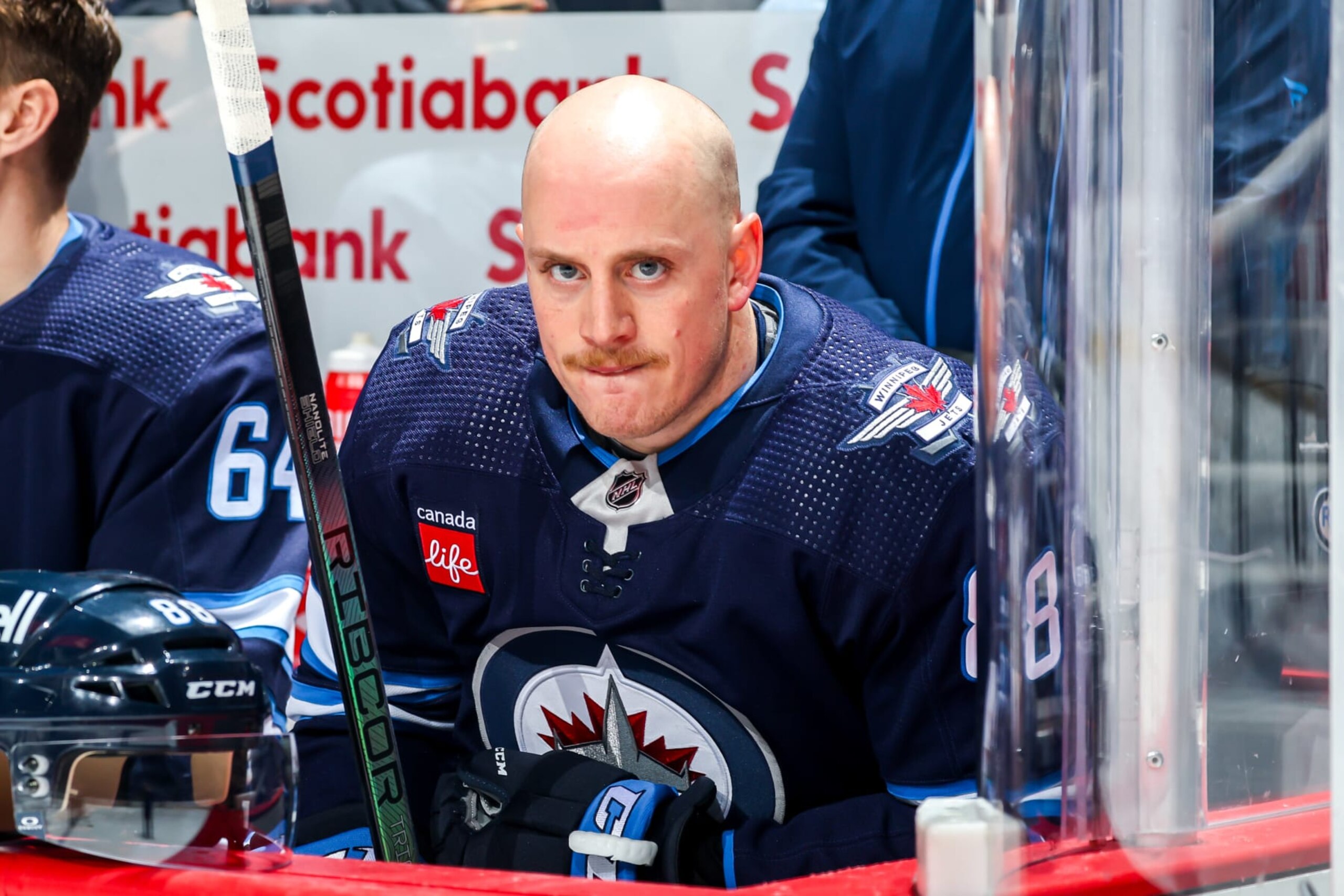WINNIPEG, CANADA - APRIL 18: Nate Schmidt #88 of the Winnipeg Jets looks on from the bench prior to puck drop against the Vancouver Canucks at the Canada Life Centre on April 18, 2024 in Winnipeg, Manitoba, Canada. (Photo by Jonathan Kozub/NHLI via Getty Images)