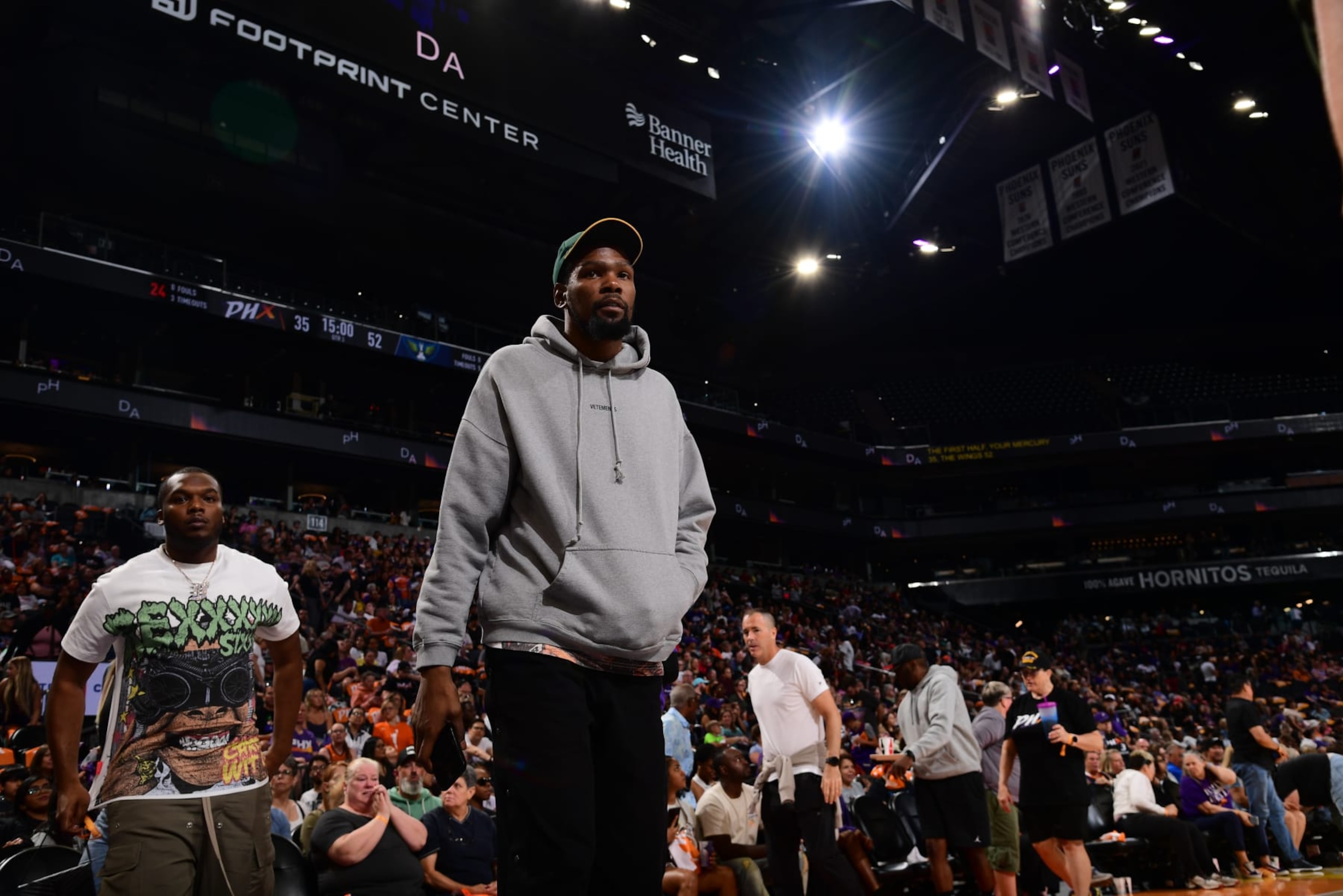 PHOENIX, AZ - MAY 25: Kevin Durant #35 of the Phoenix Suns attends the Dallas Wings game against the Phoenix Mercury on May 25, 2024 at Footprint Center in Phoenix, Arizona. NOTE TO USER: User expressly acknowledges and agrees that, by downloading and or using this photograph, user is consenting to the terms and conditions of the Getty Images License Agreement. Mandatory Copyright Notice: Copyright 2024 NBAE (Photo by Kate Frese/NBAE via Getty Images)