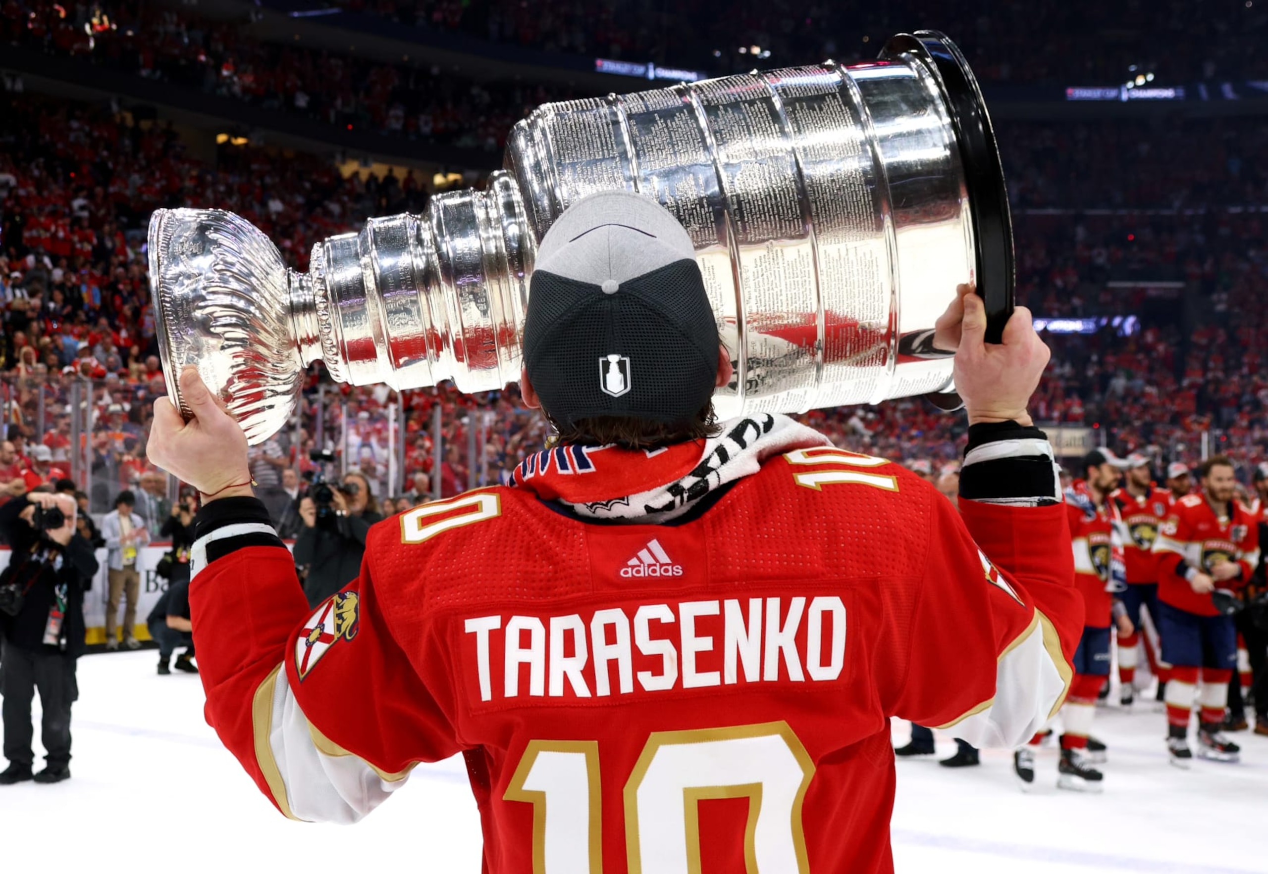 SUNRISE, FLORIDA - JUNE 24: Vladimir Tarasenko #10 of the Florida Panthers kisses the Stanley Cup after Game Seven of the 2024 Stanley Cup Final between the Edmonton Oilers and the Florida Panthers at Amerant Bank Arena on June 24, 2024 in Sunrise, Florida. (Photo by Dave Sandford/NHLI via Getty Images)