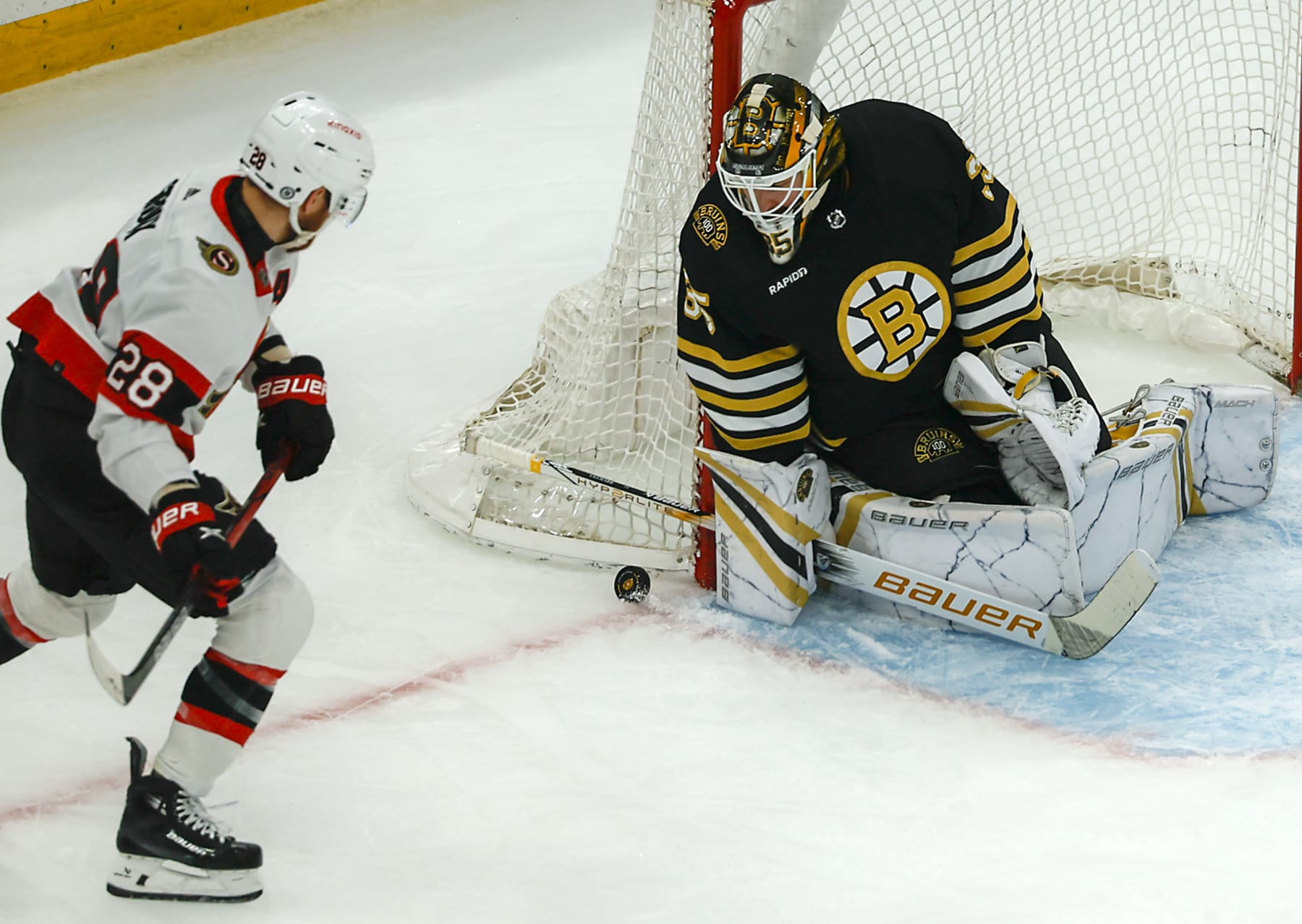 Boston, MA - April 16: Boston Bruins goalie Linus Ullmark denies Ottawa Senators right wing Claude Giroux's shot on goal in the first period. (Photo by Matthew J. Lee/The Boston Globe via Getty Images)