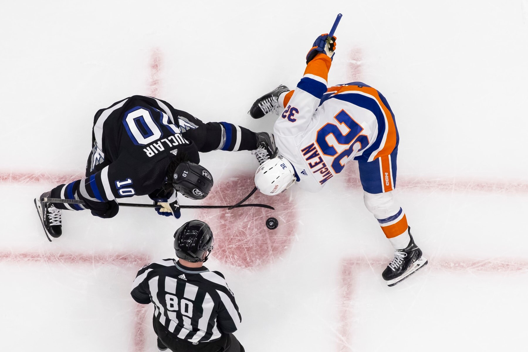 TAMPA, FL - MARCH 30: Anthony Duclair #10 of the Tampa Bay Lightning against Kyle MacLean #32 of the New York Islanders during the first period at Amalie Arena on March 30, 2024 in Tampa, Florida. (Photo by Mike Carlson/NHLI via Getty Images)