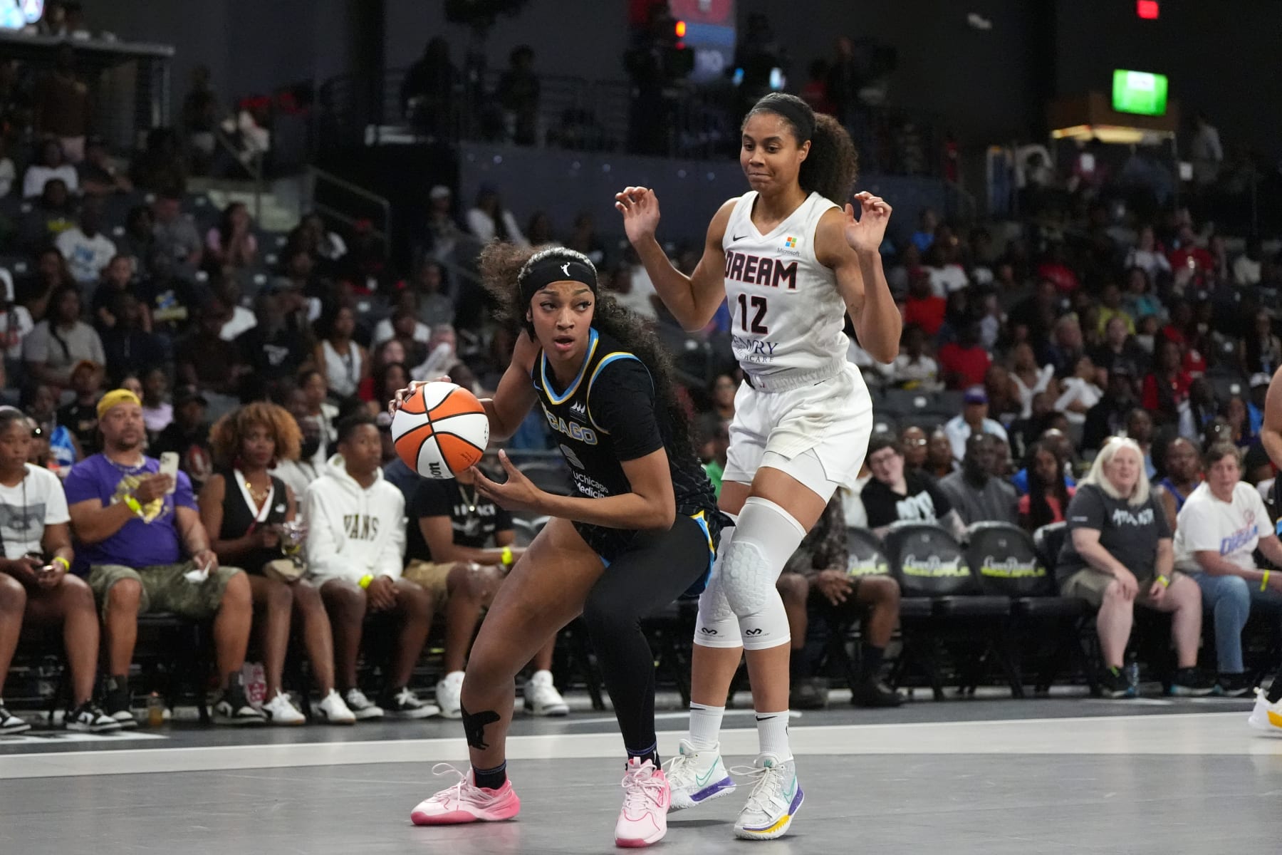 ATLANTA, GA - JULY 2: Angel Reese #5 of the Chicago Sky handles the ball during the game against the Atlanta Dream on July 2, 2024 at Gateway Center Arena at College Park in Atlanta, Georgia. NOTE TO USER: User expressly acknowledges and agrees that, by downloading and or using this photograph, User is consenting to the terms and conditions of the Getty Images License Agreement. Mandatory Copyright Notice: Copyright 2024 NBAE (Photo by Dale Zanine/NBAE via Getty Images)