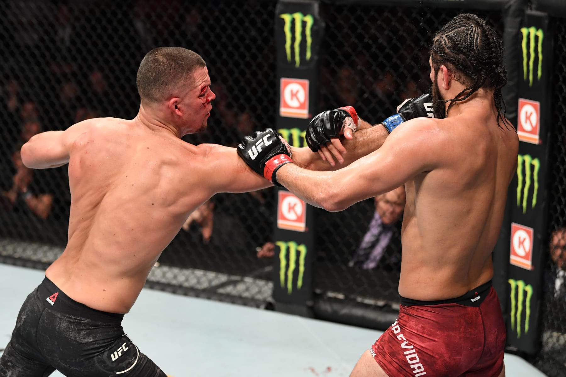 NEW YORK, NEW YORK - NOVEMBER 02: (L-R) Nate Diaz punches Jorge Masvidal in their welterweight bout for the BMF title during the UFC 244 event at Madison Square Garden on November 02, 2019 in New York City. (Photo by Josh Hedges/Zuffa LLC via Getty Images)