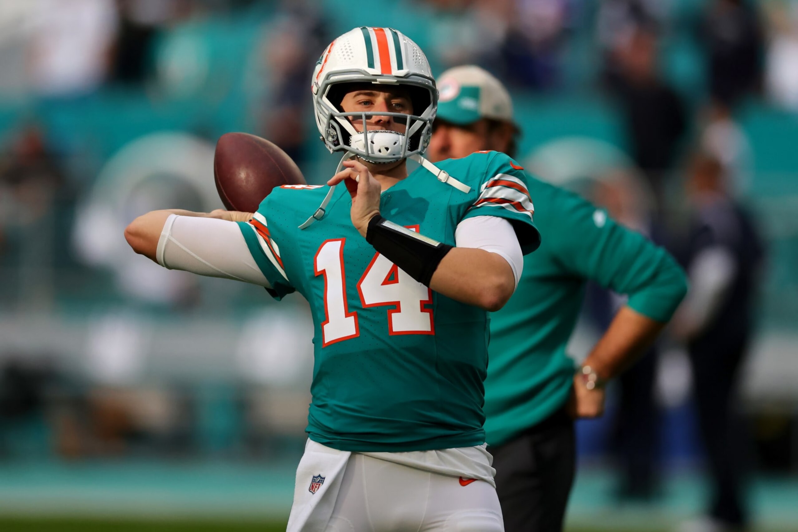 MIAMI GARDENS, FLORIDA - DECEMBER 24: Mike White #14 of the Miami Dolphins warms up prior to the game against the Dallas Cowboys at Hard Rock Stadium on December 24, 2023 in Miami Gardens, Florida. (Photo by Stacy Revere/Getty Images)