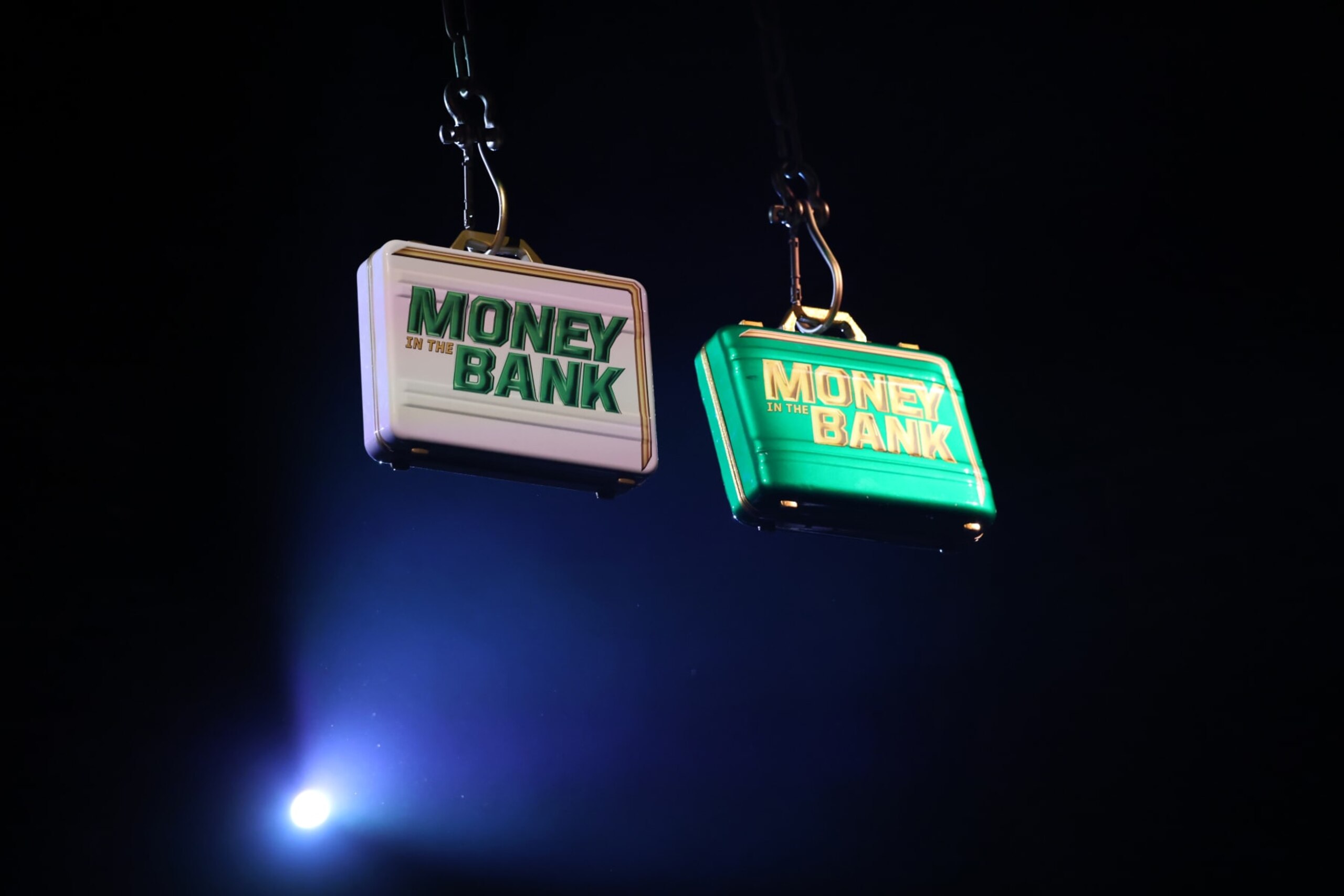 ROSEMONT, ILLINOIS - JUNE 21: Men's and Women's Money in the Bank Briefcases are seen above the ring during WWE SmackDown at Allstate Arena on June 21, 2024 in Rosemont, Illinois. (Photo by WWE/Getty Images) ROSEMONT, ILLINOIS - JUNE 21: Men's and Women's Money in the Bank Briefcases are seen above the ring during WWE SmackDown at Allstate Arena on June 21, 2024 in Rosemont, Illinois. (Photo by WWE/Getty Images)