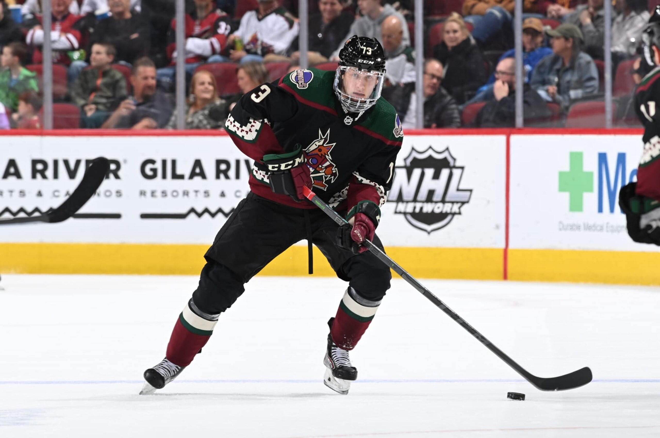 GLENDALE, ARIZONA - APRIL 01: Jan Jenik #93 of the Arizona Coyotes skates with the puck against the Anaheim Ducks at Gila River Arena on April 01, 2022 in Glendale, Arizona. (Photo by Norm Hall/NHLI via Getty Images)