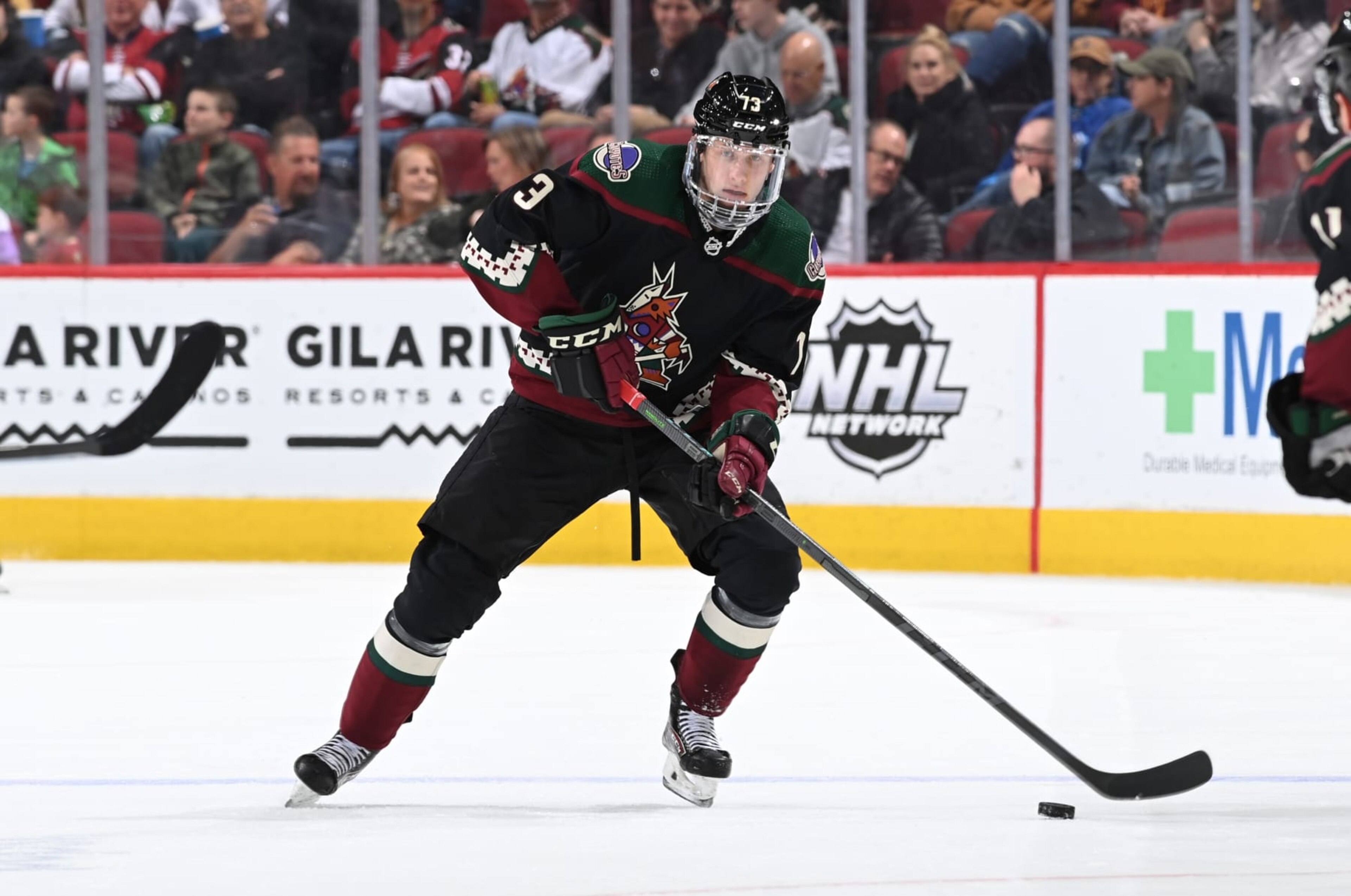 GLENDALE, ARIZONA - APRIL 01: Jan Jenik #93 of the Arizona Coyotes skates with the puck against the Anaheim Ducks at Gila River Arena on April 01, 2022 in Glendale, Arizona. (Photo by Norm Hall/NHLI via Getty Images)