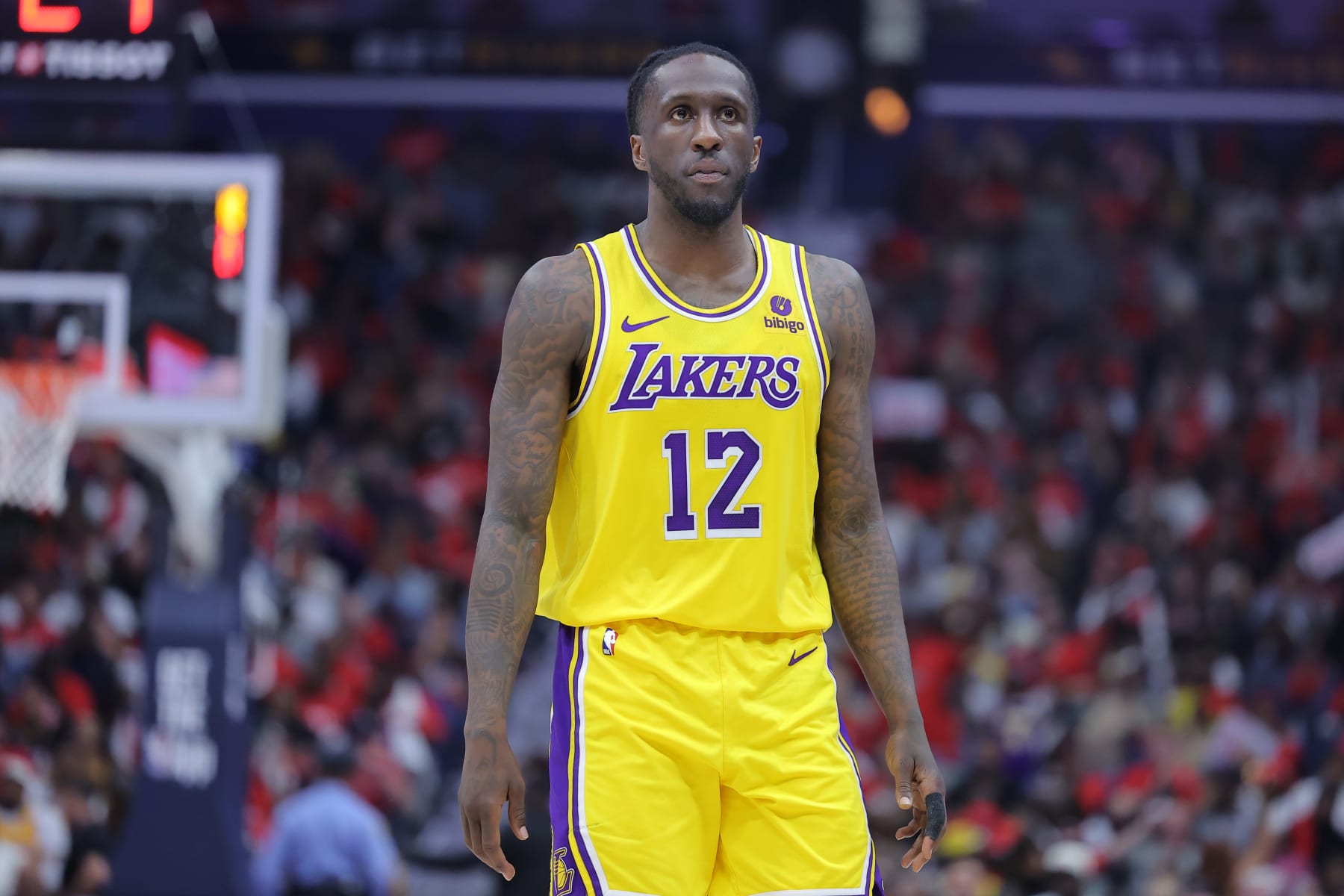 NEW ORLEANS, LOUISIANA - APRIL 16: Taurean Prince #12 of the Los Angeles Lakers reacts against the New Orleans Pelicans during a play-in tournament game at the Smoothie King Center on April 16, 2024 in New Orleans, Louisiana. NOTE TO USER: User expressly acknowledges and agrees that, by downloading and or using this Photograph, user is consenting to the terms and conditions of the Getty Images License Agreement. (Photo by Jonathan Bachman/Getty Images)