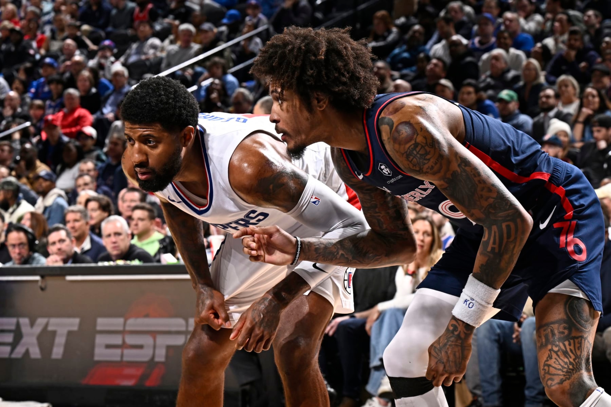 PHILADELPHIA, PA - MARCH 27: Paul George #13 of the LA Clippers and Kelly Oubre Jr. #9 of the Philadelphia 76ers wait for a rebound during the game  on March 27, 2024 at the Wells Fargo Center in Philadelphia, Pennsylvania NOTE TO USER: User expressly acknowledges and agrees that, by downloading and/or using this Photograph, user is consenting to the terms and conditions of the Getty Images License Agreement. Mandatory Copyright Notice: Copyright 2024 NBAE (Photo by David Dow/NBAE via Getty Images)