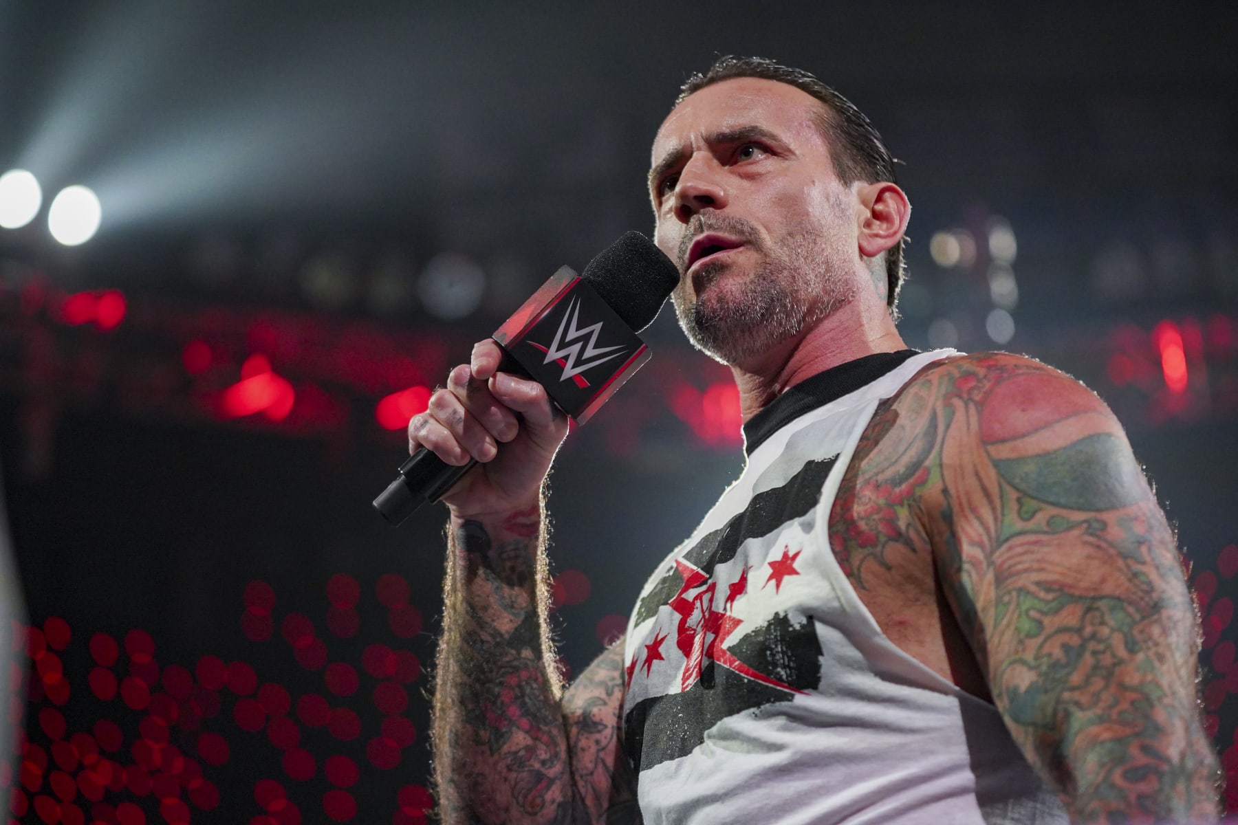 HARTFORD, CONNECTICUT - MAY 6: CM Punk talks to the WWE Universe during Monday Night RAW at XL Center on May 6, 2024 in Hartford, Connecticut.  (Photo by WWE/Getty Images)