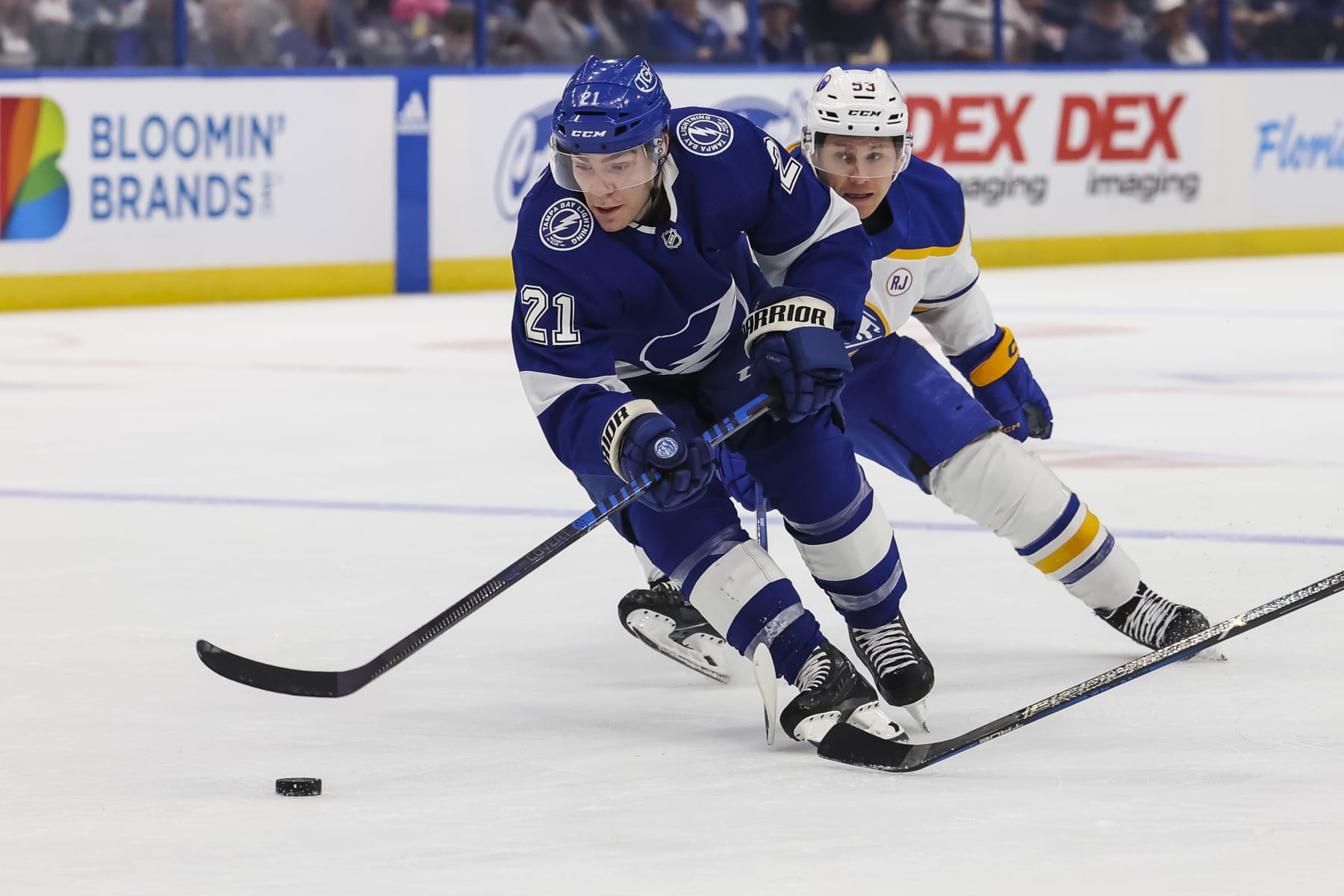 TAMPA, FL - APRIL 15: Brayden Point #21 of the Tampa Bay Lightning against Jeff Skinner #53 of the Buffalo Sabres during the first period at Amalie Arena on April 15, 2024 in Tampa, Florida. (Photo by Mark LoMoglio/NHLI via Getty Images)
