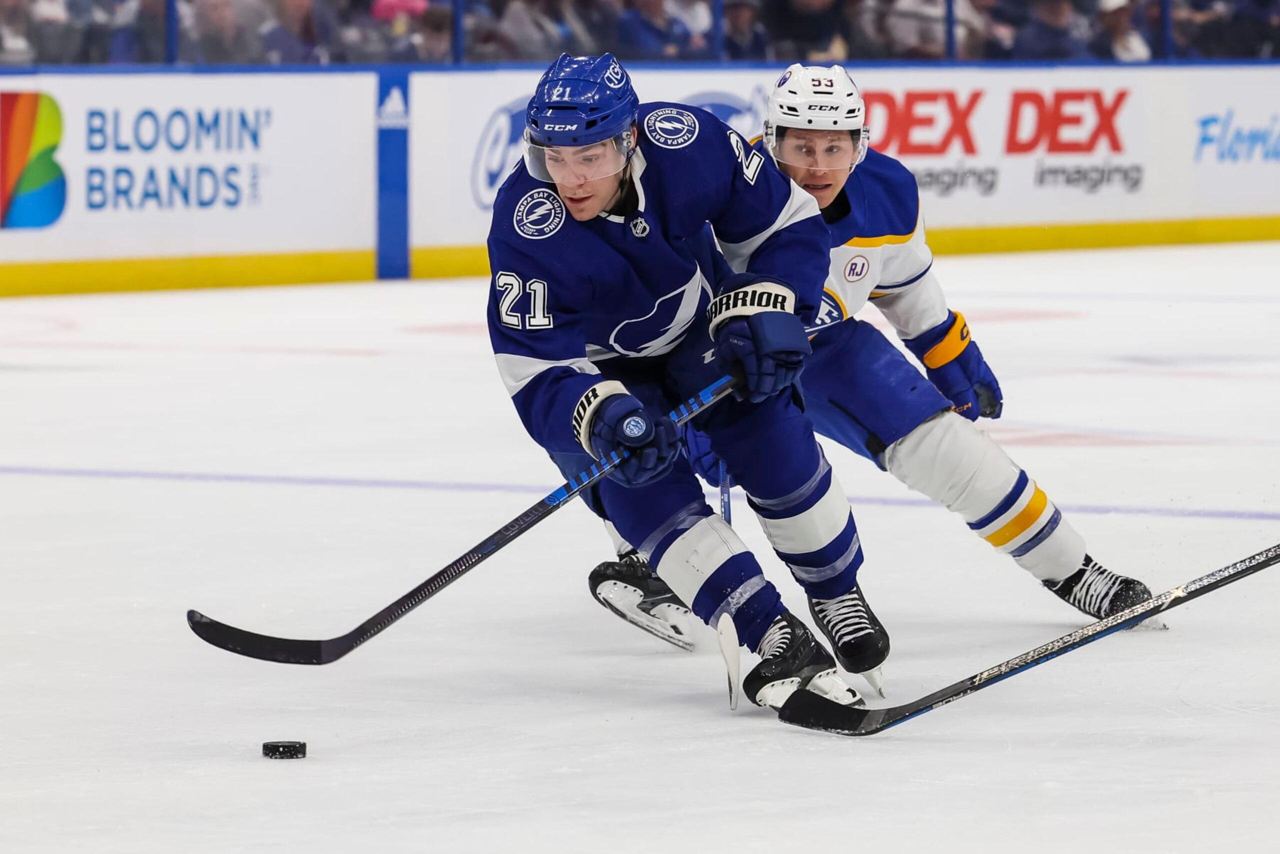TAMPA, FL - APRIL 15: Brayden Point #21 of the Tampa Bay Lightning against Jeff Skinner #53 of the Buffalo Sabres during the first period at Amalie Arena on April 15, 2024 in Tampa, Florida. (Photo by Mark LoMoglio/NHLI via Getty Images)