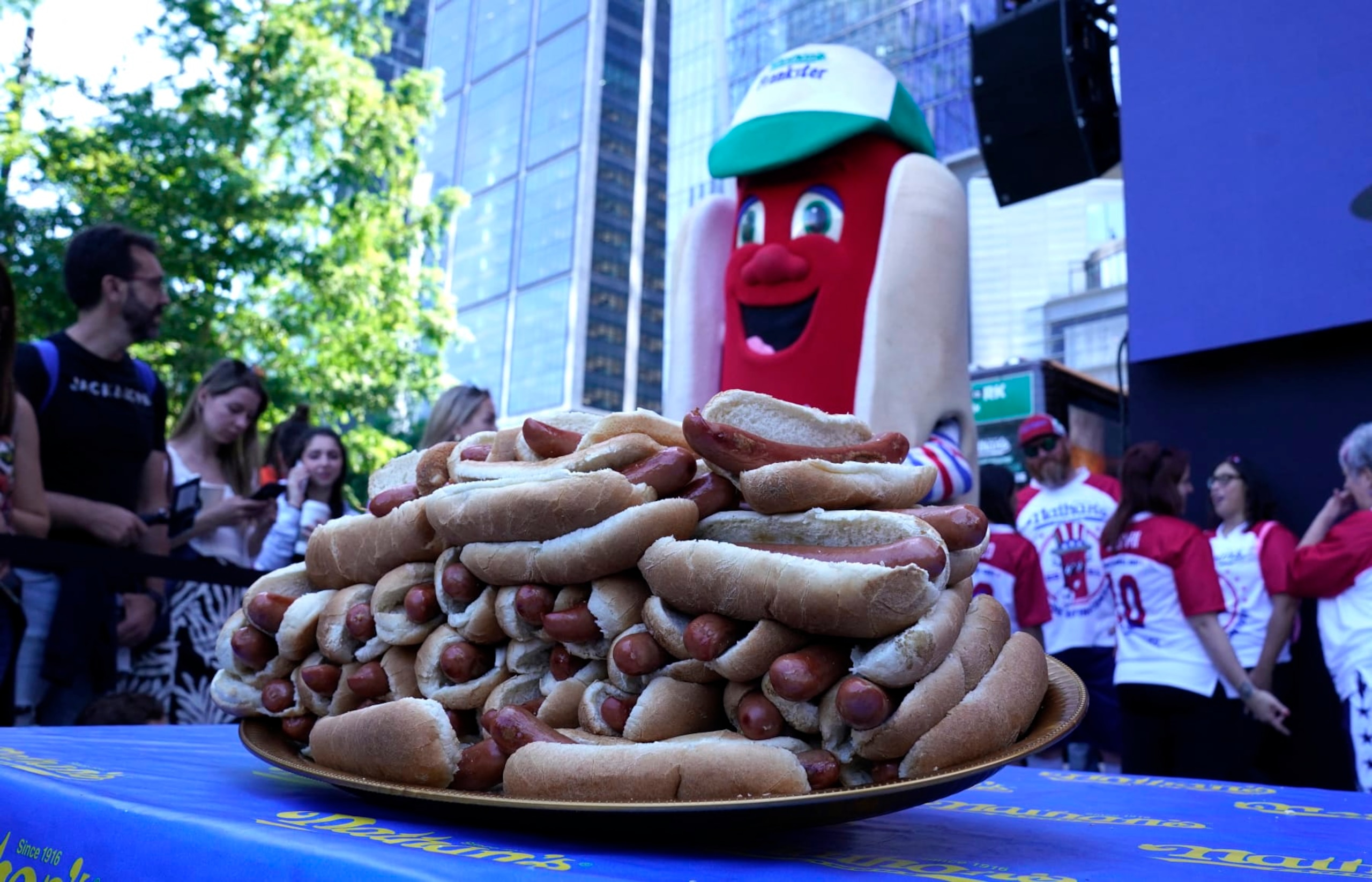 A tray of hot dogs are on display during a weigh-in for the 2024 Nathan's Famous Fourth of July International Hot Dog-Eating Championship at Hudson Yards in New York City on July 3, 2024. The contest will take place in Coney Island, New York on July 4, 2024. (Photo by TIMOTHY A. CLARY / AFP) (Photo by TIMOTHY A. CLARY/AFP via Getty Images)