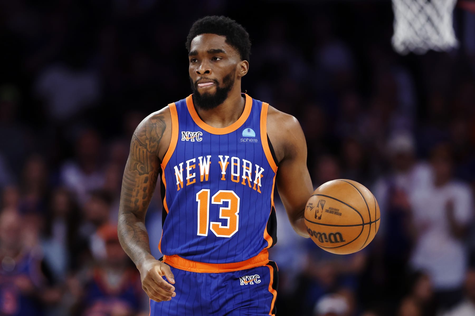 NEW YORK, NEW YORK - MAY 14: Shake Milton #13 of the New York Knicks dribbles during Game Five of the Eastern Conference Second Round Playoffs against the Indiana Pacers at Madison Square Garden on May 14, 2024 in New York City. The Knicks won 121-91. NOTE TO USER: User expressly acknowledges and agrees that, by downloading and or using this photograph, User is consenting to the terms and conditions of the Getty Images License Agreement. (Photo by Sarah Stier/Getty Images)