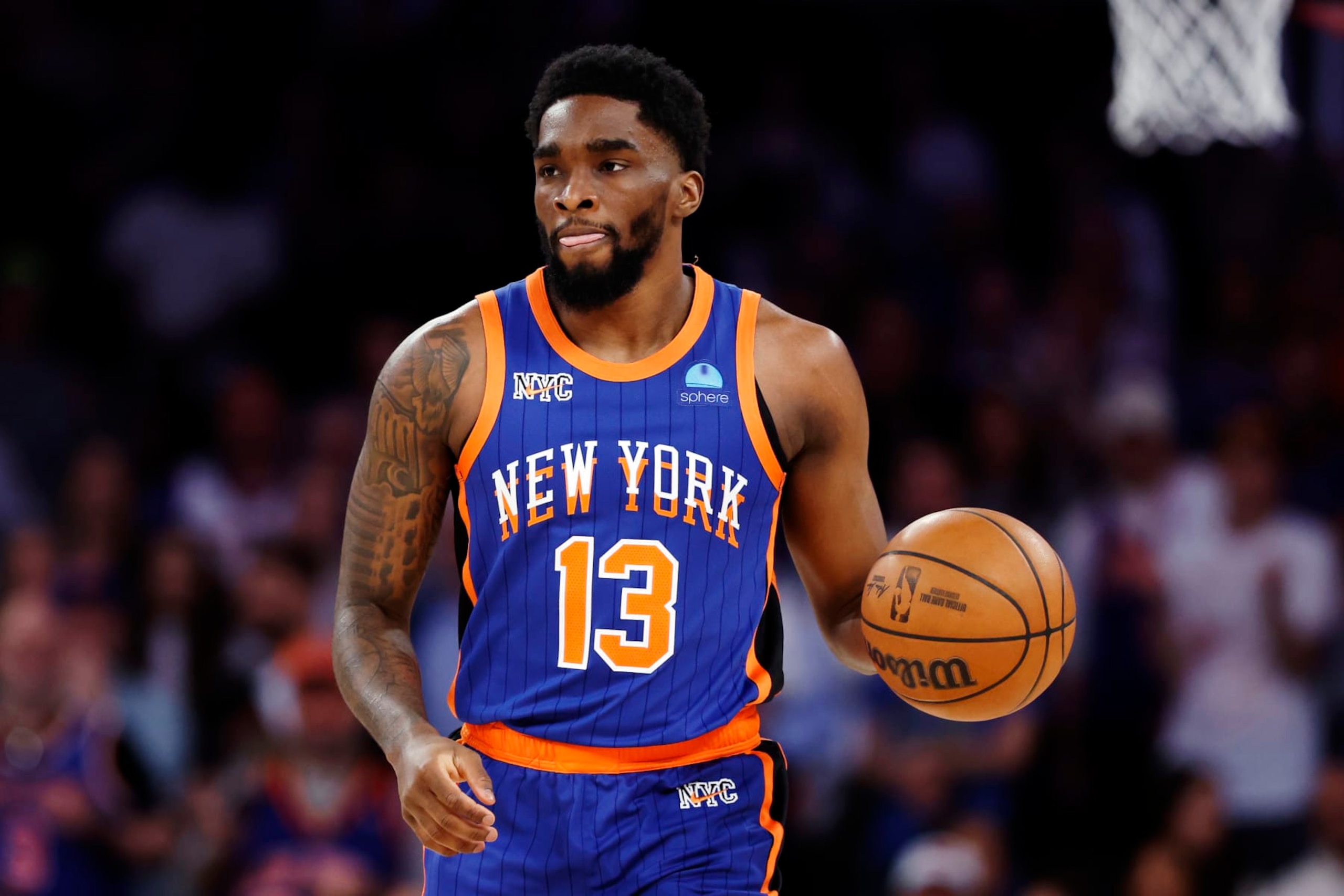 NEW YORK, NEW YORK - MAY 14: Shake Milton #13 of the New York Knicks dribbles during Game Five of the Eastern Conference Second Round Playoffs against the Indiana Pacers at Madison Square Garden on May 14, 2024 in New York City. The Knicks won 121-91. NOTE TO USER: User expressly acknowledges and agrees that, by downloading and or using this photograph, User is consenting to the terms and conditions of the Getty Images License Agreement. (Photo by Sarah Stier/Getty Images)