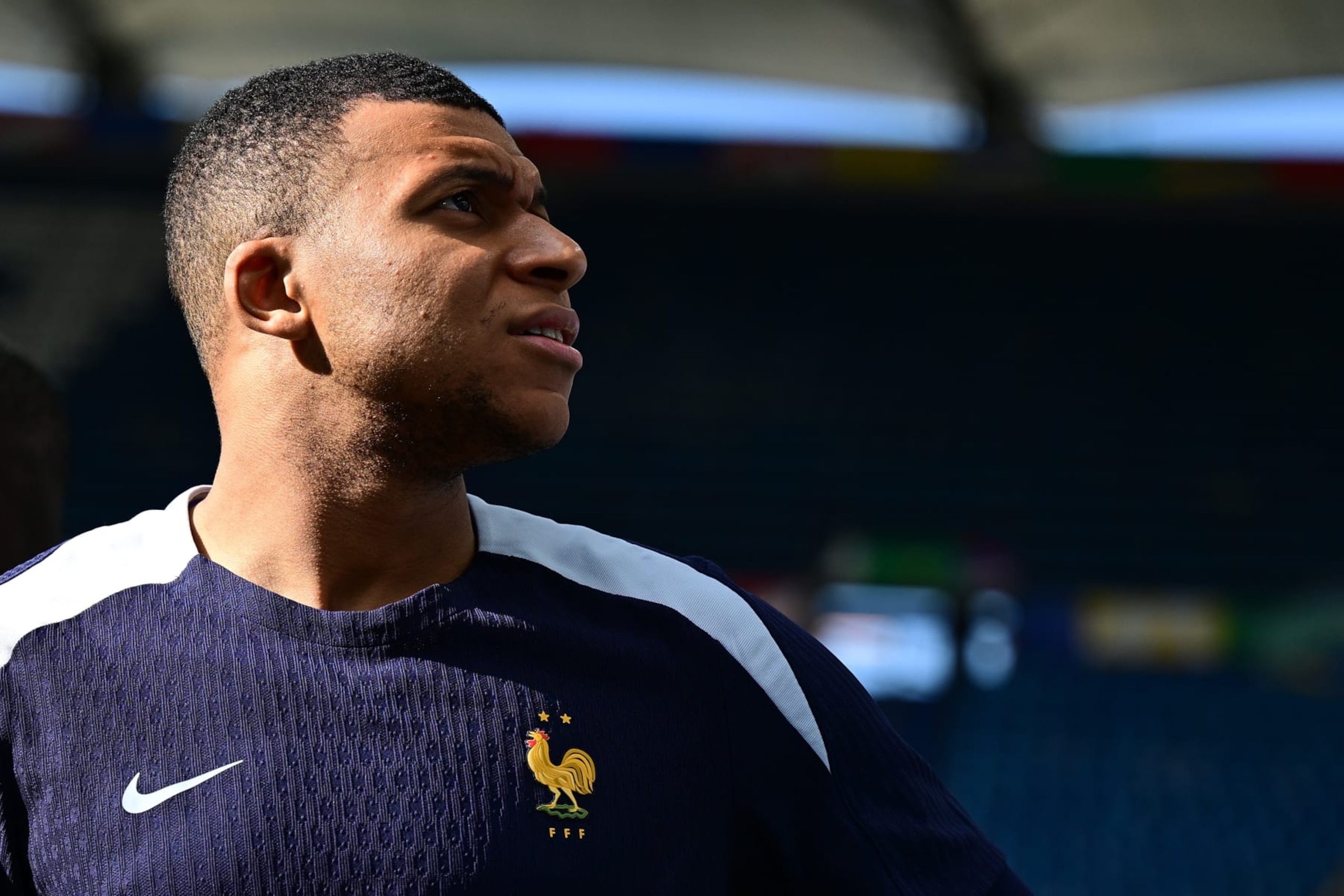 HAMBURG, GERMANY - JULY 04: Kylian Mbappe of France looks on during a France training session at Volksparkstadion on July 04, 2024 in Hamburg, Germany. (Photo by Tullio Puglia - UEFA/UEFA via Getty Images) HAMBURG, GERMANY - JULY 04: Kylian Mbappe of France looks on during a France training session at Volksparkstadion on July 04, 2024 in Hamburg, Germany. (Photo by Tullio Puglia - UEFA/UEFA via Getty Images)