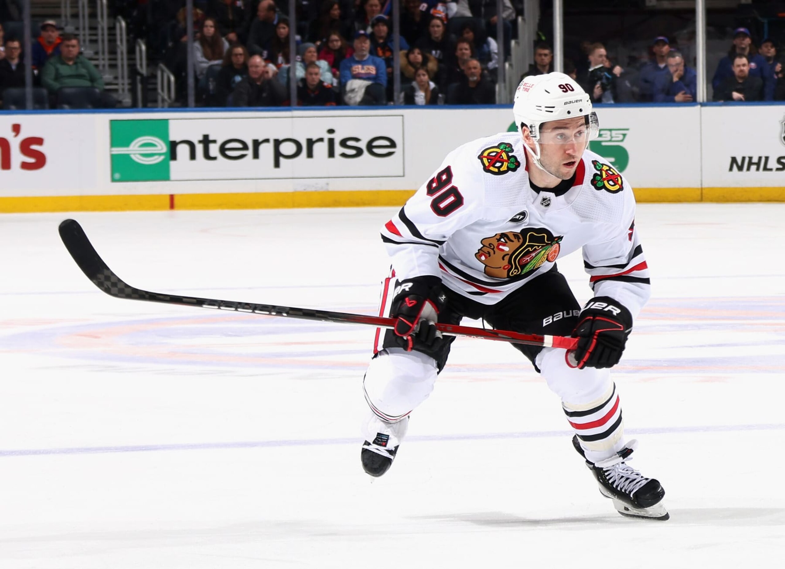 ELMONT, NEW YORK - APRIL 02: Tyler Johnson #90 of the Chicago Blackhawks skates against the New York Islanders at UBS Arena on April 02, 2024 in Elmont, New York. (Photo by Bruce Bennett/Getty Images)