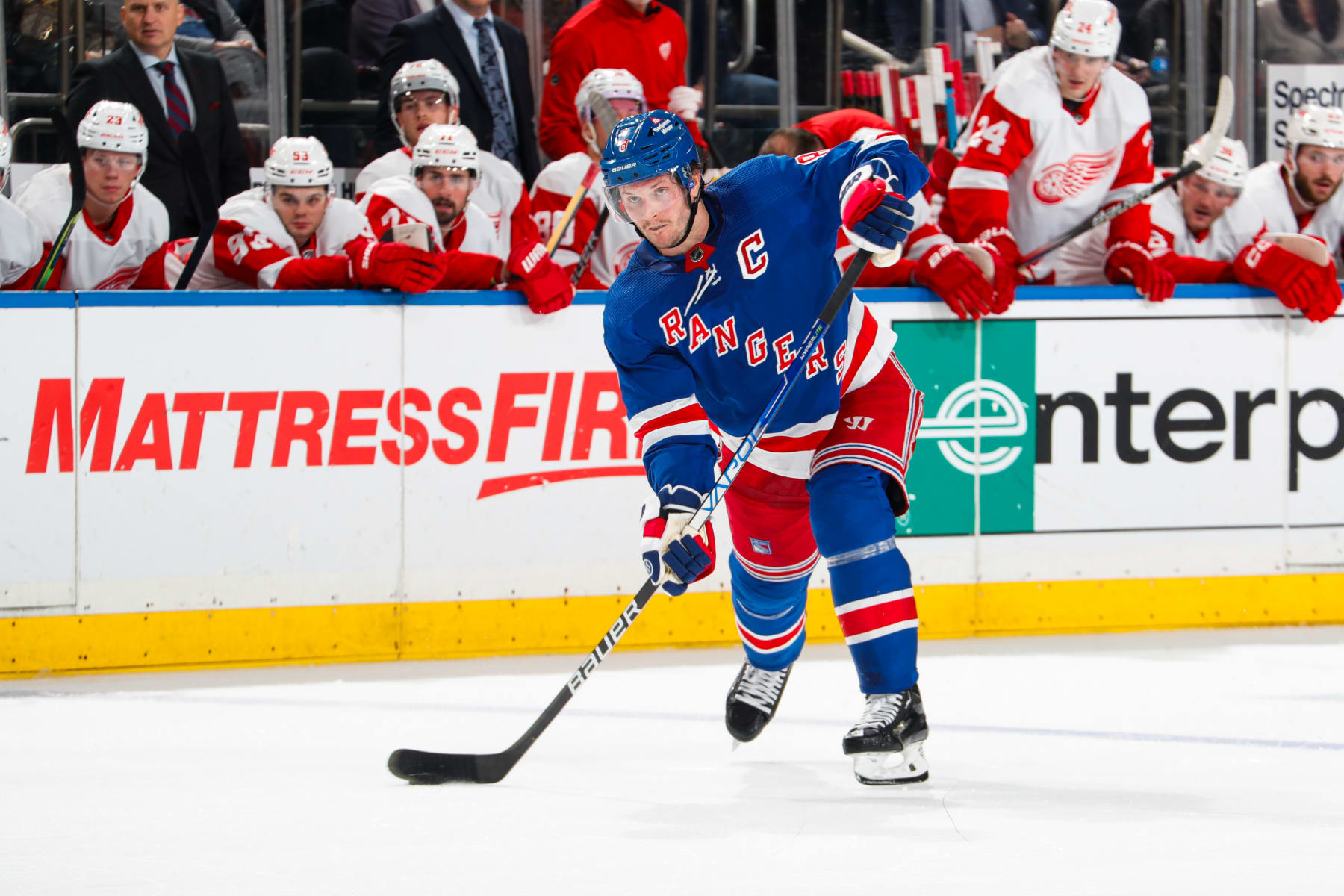 NEW YORK, NEW YORK - NOVEMBER 07:  Jacob Trouba #8 of the New York Rangers skates with the puck against the Detroit Red Wings at Madison Square Garden on November 7, 2023 in New York City. (Photo by Jared Silber/NHLI via Getty Images)