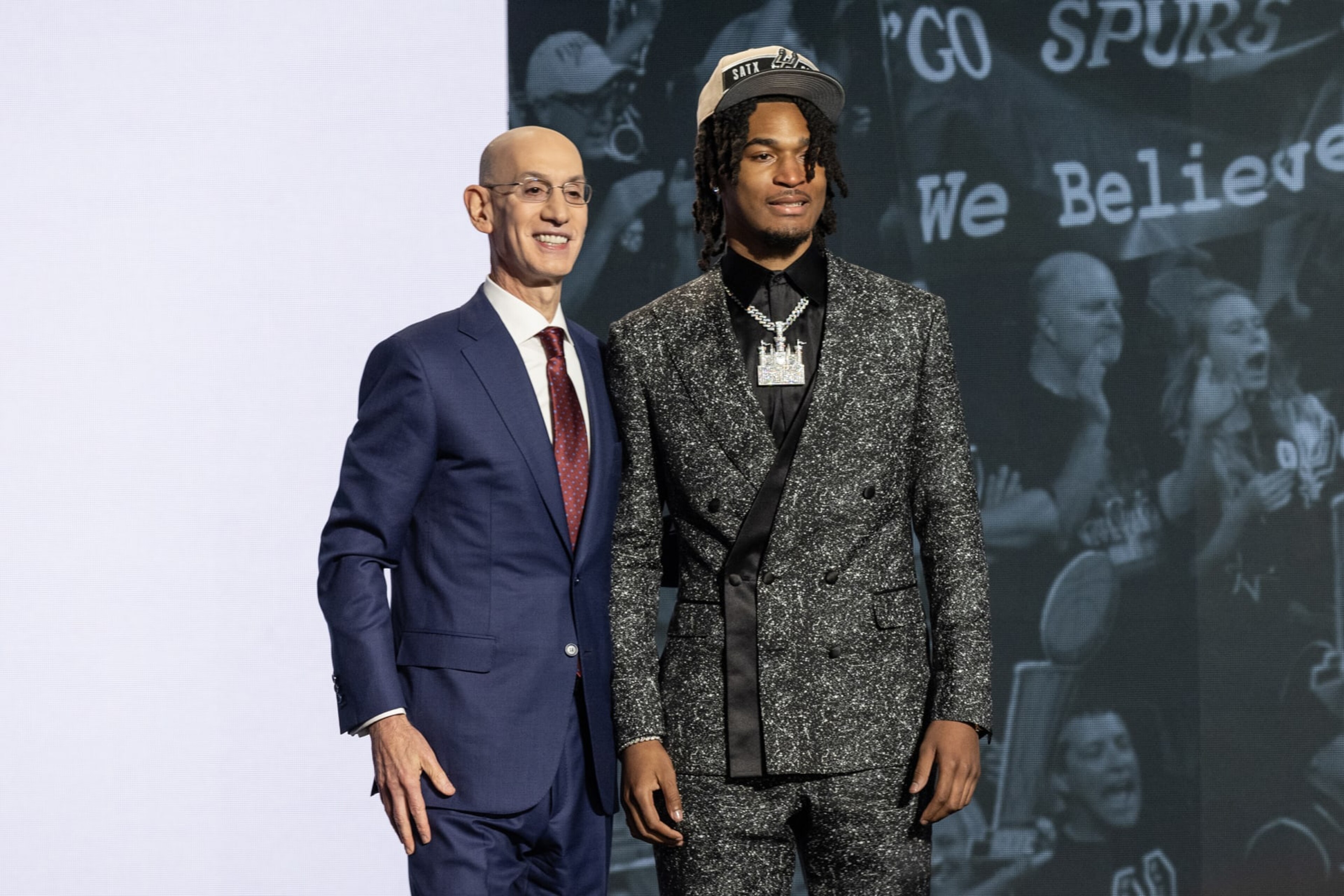 NEW YORK, UNITED STATES - JUNE 26: Commissioner Adam Silver shakes hands with Stephon Castle, selected as number four by the San Antonio Spurs, in the first round of the 2024 NBA Draft at the Barclays Center in Brooklyn, New York on June 26, 2024 (Photo by Lev Radin/Anadolu via Getty Images) NEW YORK, UNITED STATES - JUNE 26: Commissioner Adam Silver shakes hands with Stephon Castle, selected as number four by the San Antonio Spurs, in the first round of the 2024 NBA Draft at the Barclays Center in Brooklyn, New York on June 26, 2024 (Photo by Lev Radin/Anadolu via Getty Images)