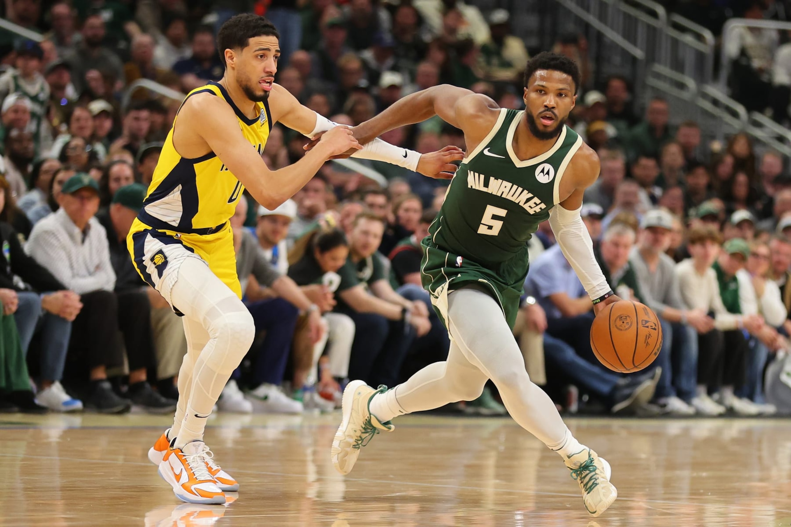 MILWAUKEE, WISCONSIN - APRIL 30: Malik Beasley #5 of the Milwaukee Bucks drives around Tyrese Haliburton #0 of the Indiana Pacers during the second half of game five of the Eastern Conference First Round Playoffs at Fiserv Forum on April 30, 2024 in Milwaukee, Wisconsin. NOTE TO USER: User expressly acknowledges and agrees that, by downloading and or using this photograph, User is consenting to the terms and conditions of the Getty Images License Agreement. (Photo by Stacy Revere/Getty Images) MILWAUKEE, WISCONSIN - APRIL 30: Malik Beasley #5 of the Milwaukee Bucks drives around Tyrese Haliburton #0 of the Indiana Pacers during the second half of game five of the Eastern Conference First Round Playoffs at Fiserv Forum on April 30, 2024 in Milwaukee, Wisconsin. NOTE TO USER: User expressly acknowledges and agrees that, by downloading and or using this photograph, User is consenting to the terms and conditions of the Getty Images License Agreement. (Photo by Stacy Revere/Getty Images)