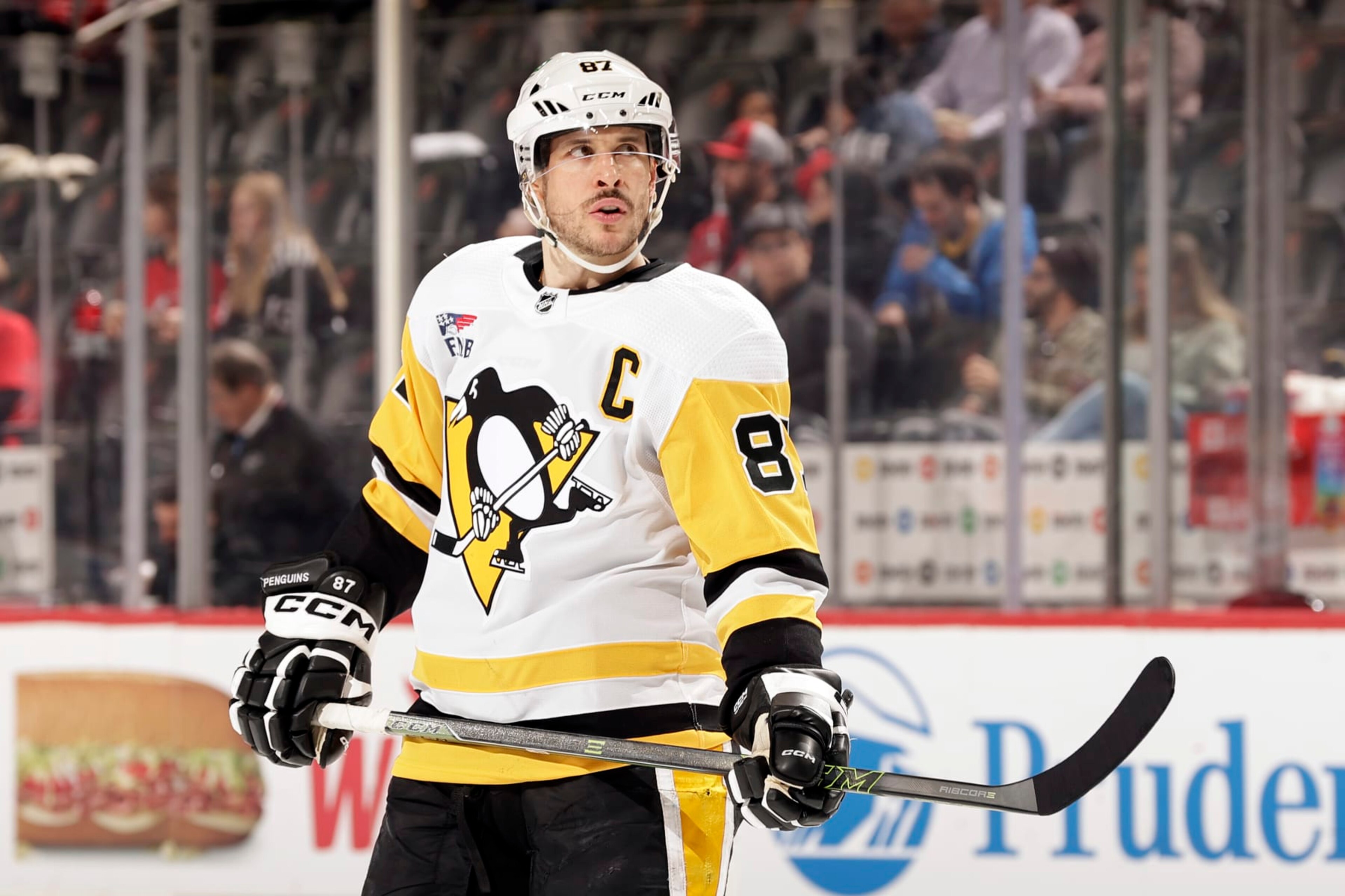 NEWARK, NJ - APRIL 2: Sidney Crosby #87 of the Pittsburgh Penguins reacts against the New Jersey Devils during the second period at the Prudential Center on April 2, 2024 in Newark, New Jersey. (Photo by Adam Hunger/Getty Images)