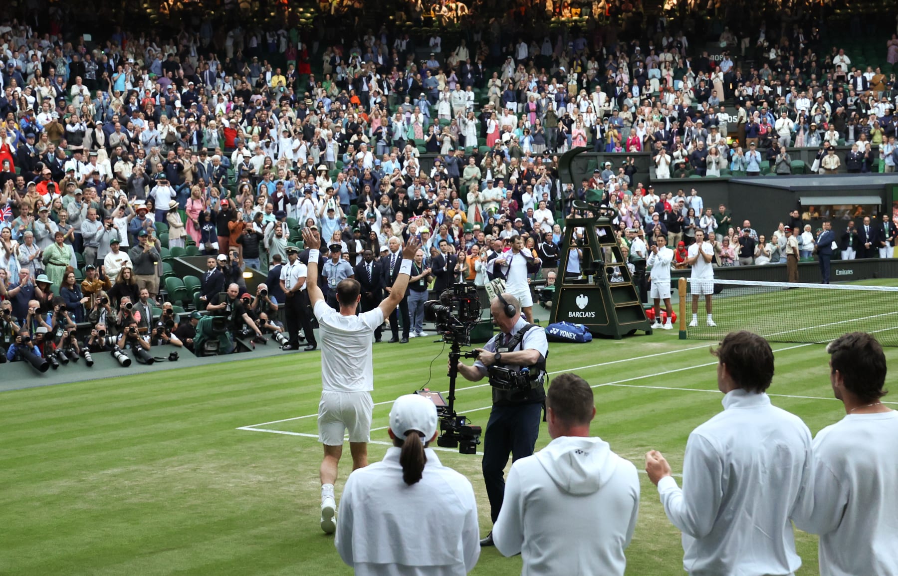 LONDON, ENGLAND - JULY 04: Andy Murray of Great Britain waves to the crowd on Centre Court following the Gentlemen’s Doubles first round match with Jamie Murray against Rinky Hijikata and John Peers of Australia during day four of The Championships Wimbledon 2024 at All England Lawn Tennis and Croquet Club on July 04, 2024 in London, England. (Photo by Clive Brunskill/Getty Images)