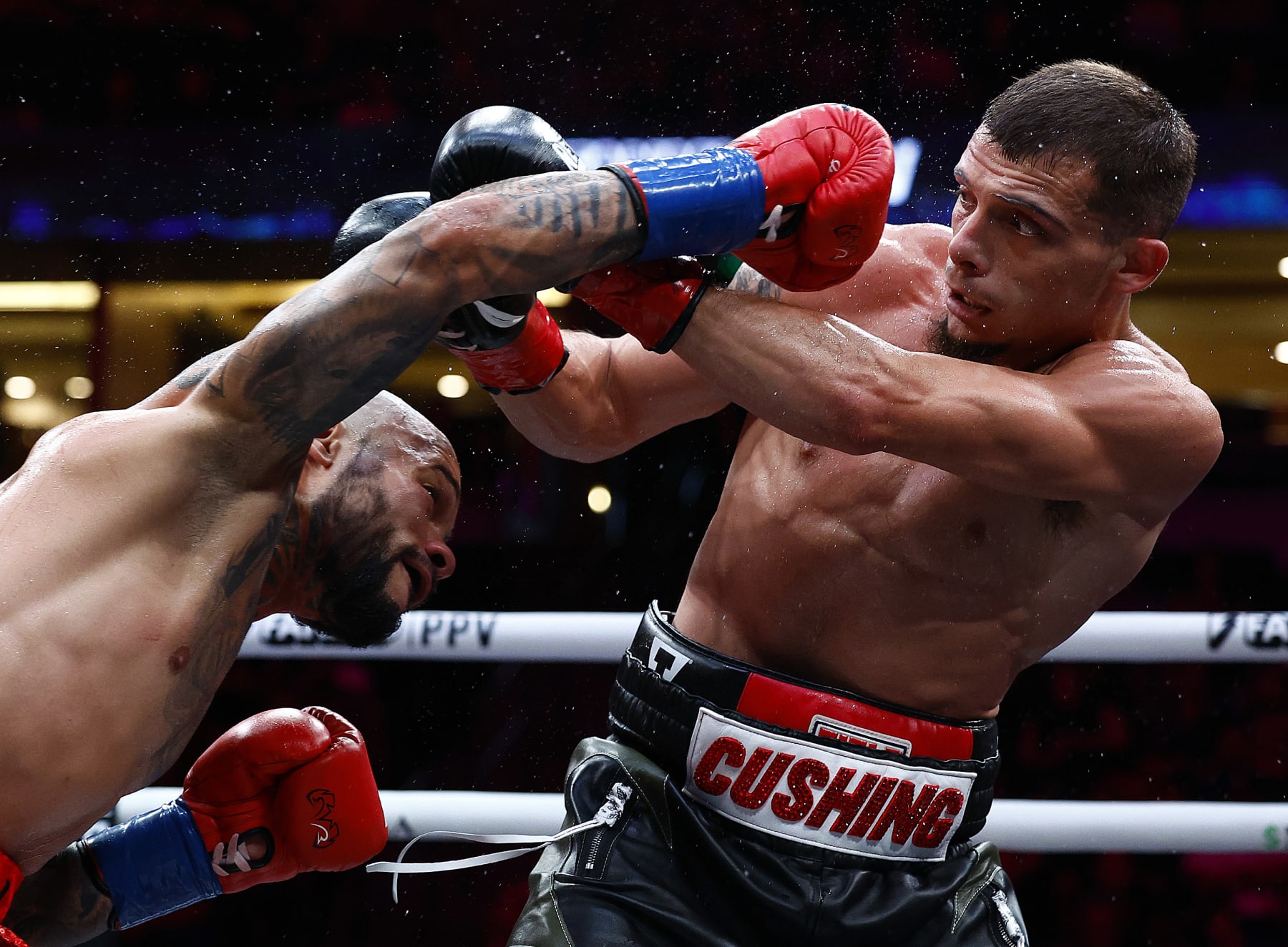 ANAHEIM, CALIFORNIA - JULY 06: (L-R) Manuel Correa and Devin Cushing during round of their lightweights fight at Honda Center on July 06, 2024 in Anaheim, California. (Photo by Ronald Martinez/Getty Images)