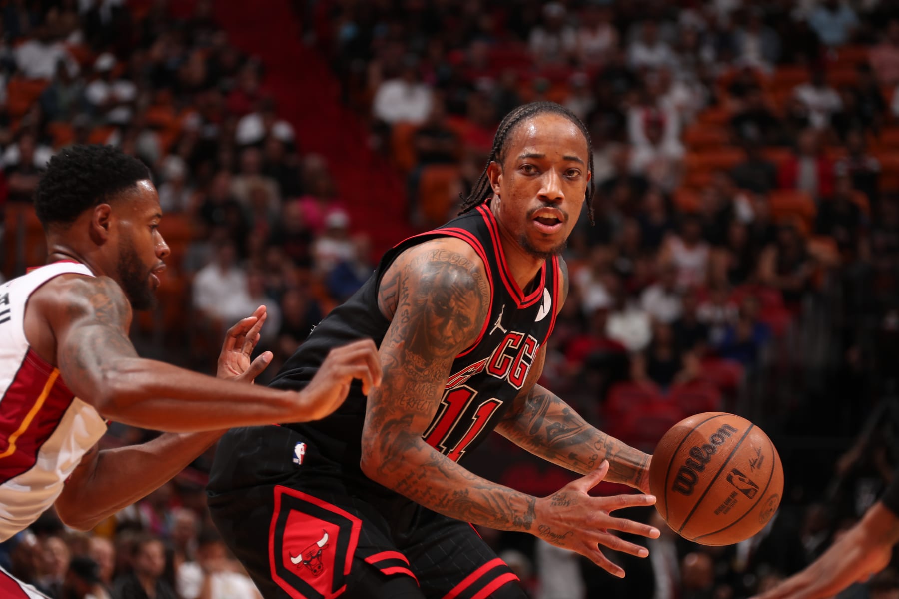 MIAMI, FL - APRIL 19: DeMar DeRozan #11 of the Chicago Bulls handles the ball during the game against the Miami Heat during the 2024 Play-In Tournament on April 19, 2024 at Kaseya Center in Miami, Florida. NOTE TO USER: User expressly acknowledges and agrees that, by downloading and or using this Photograph, user is consenting to the terms and conditions of the Getty Images License Agreement. Mandatory Copyright Notice: Copyright 2024 NBAE (Photo by Issac Baldizon/NBAE via Getty Images)