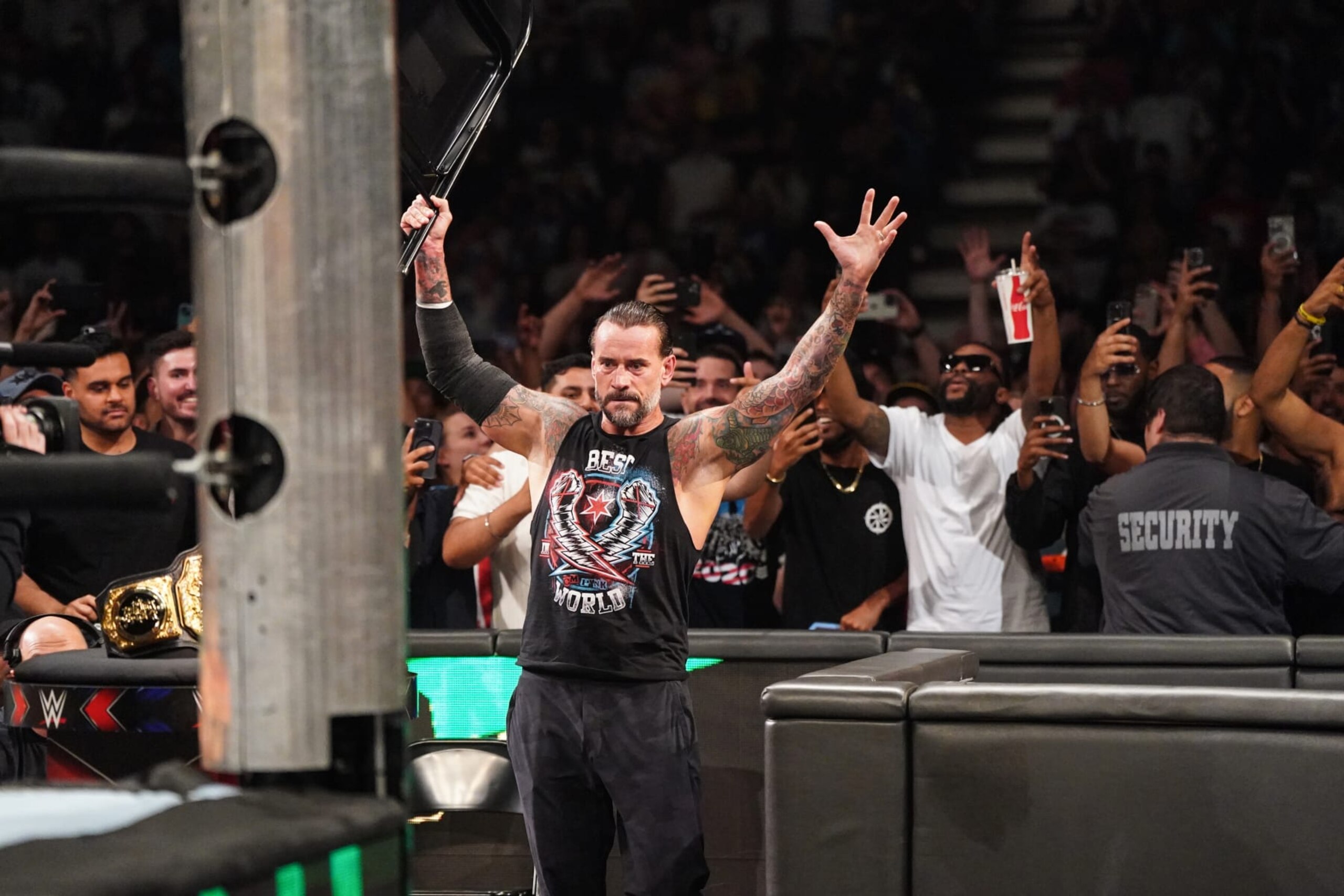 TORONTO, CANADA - JULY 6: CM Punk shows up during Money in the Bank at Scotiabank Arena on July 6, 2024 in Toronto, Ontario. (Photo by WWE/Getty Images) TORONTO, CANADA - JULY 6: CM Punk shows up during Money in the Bank at Scotiabank Arena on July 6, 2024 in Toronto, Ontario. (Photo by WWE/Getty Images)
