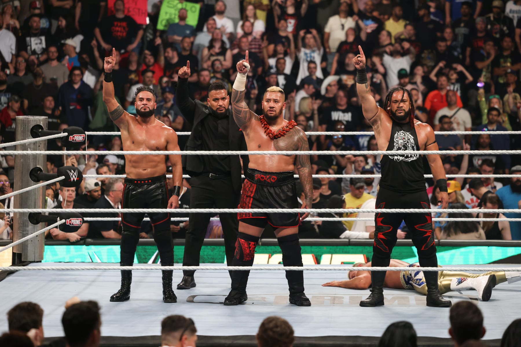 TORONTO, CANADA - JULY 6: The Bloodline celebrate their win during Money in the Bank at Scotiabank Arena on July 6, 2024 in Toronto, Ontario.  (Photo by WWE/Getty Images)