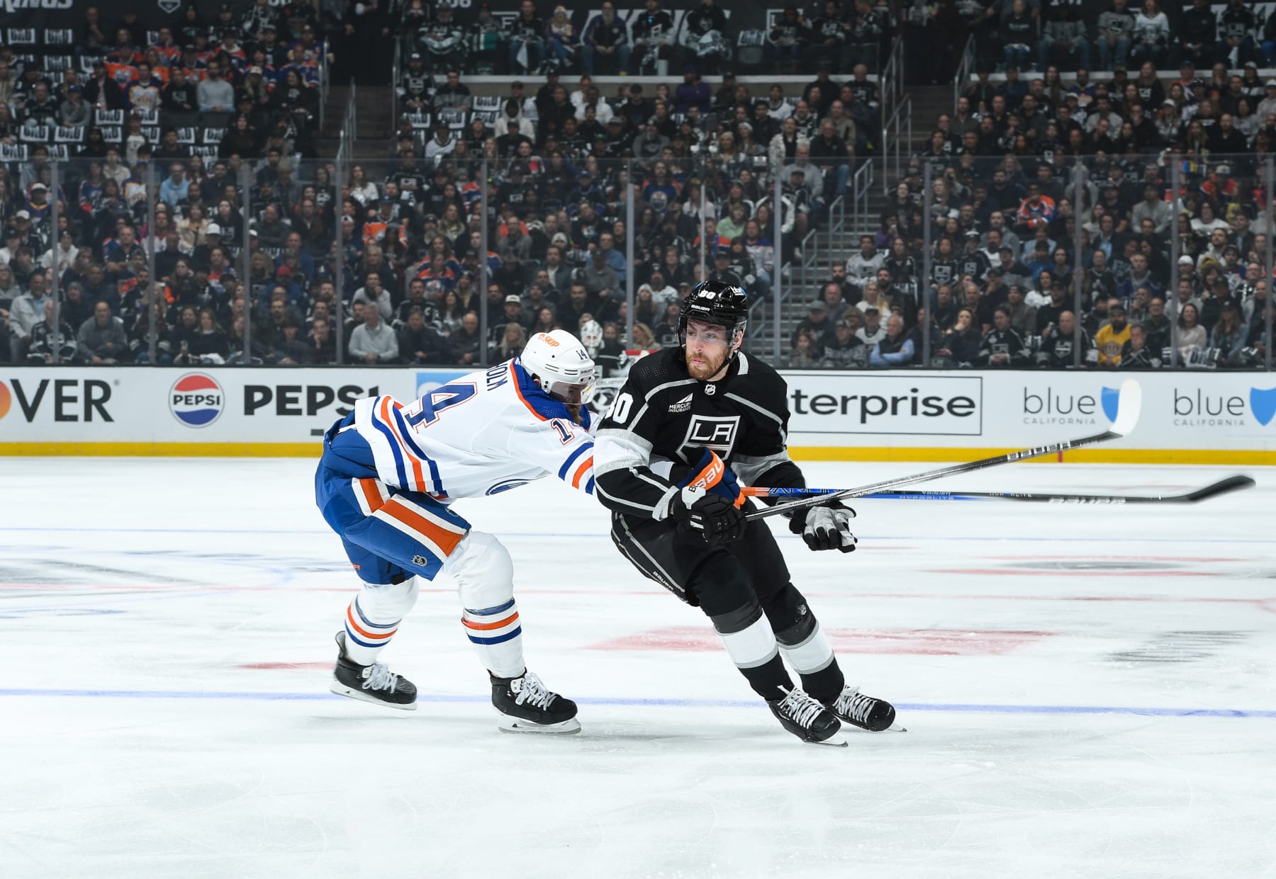 LOS ANGELES, CA - APRIL 26: Pierre-Luc Dubois #80 of the Los Angeles Kings and Mattias Ekholm #14 of the Edmonton Oilers battle for position during the first period in Game One of the First Round of the 2024 Stanley Cup Playoffs at Crypto.com Arena on April 26, 2024 in Los Angeles, California. (Photo by Andrew D. Bernstein/NHLI via Getty Images)